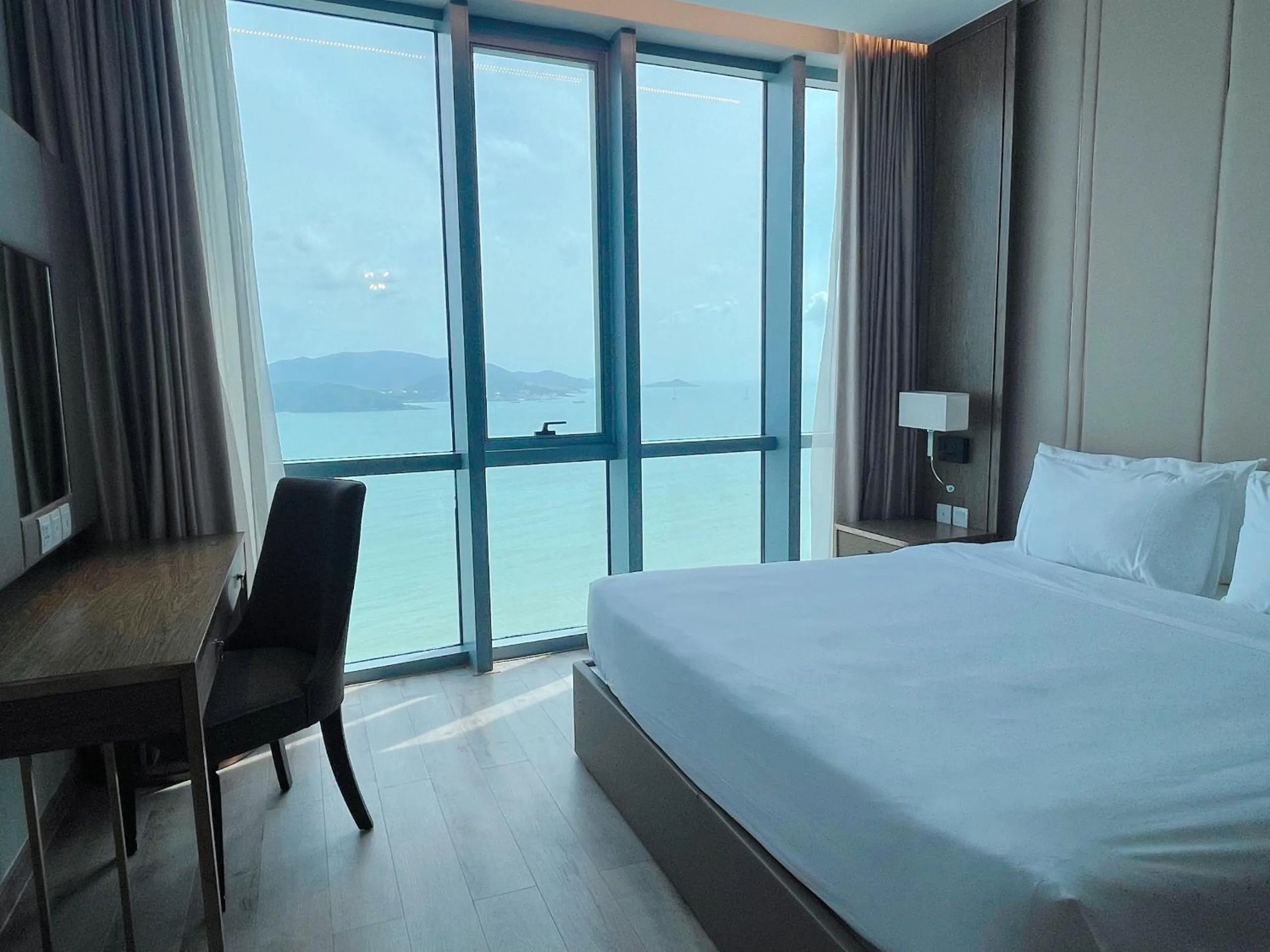 Bed in PANORAMA Condotel by HLG