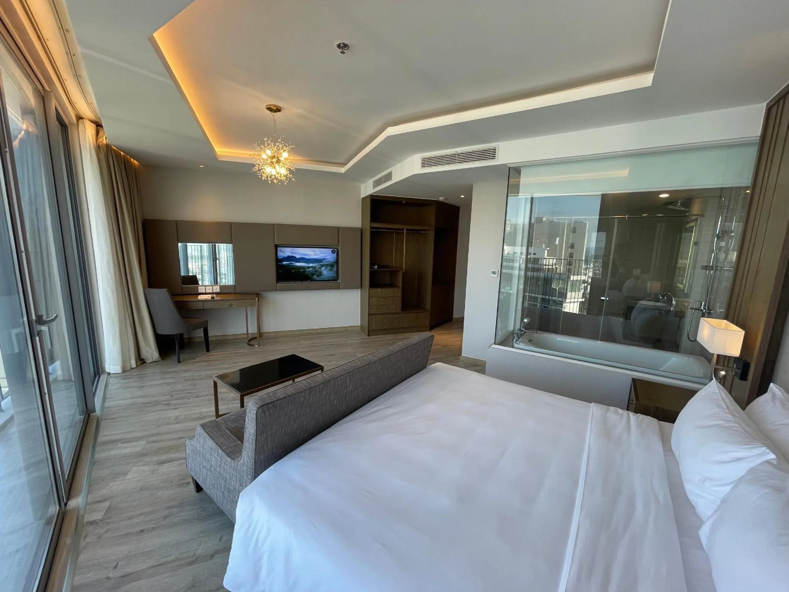 Bed in PANORAMA Condotel by HLG