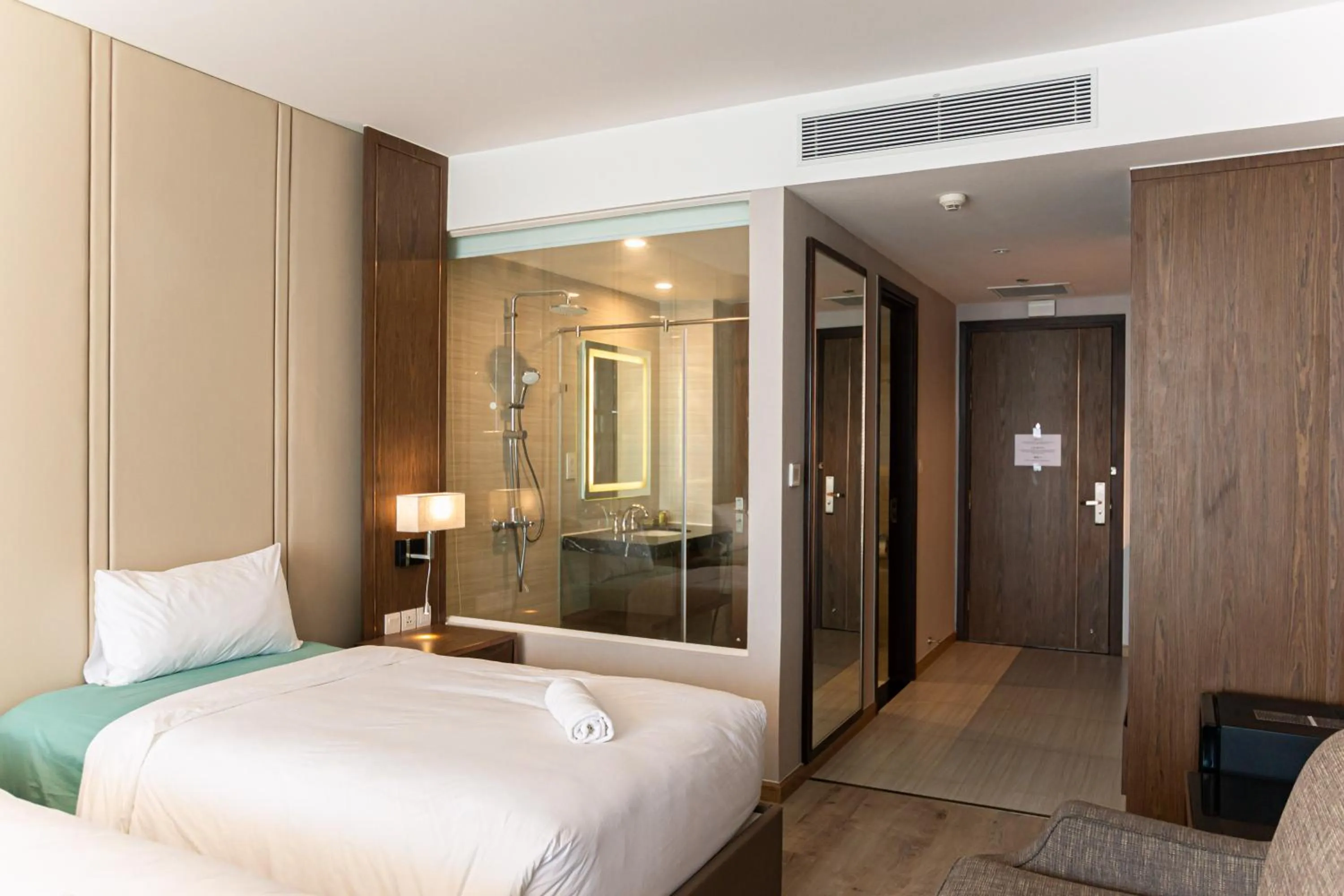 Bed in PANORAMA Condotel by HLG