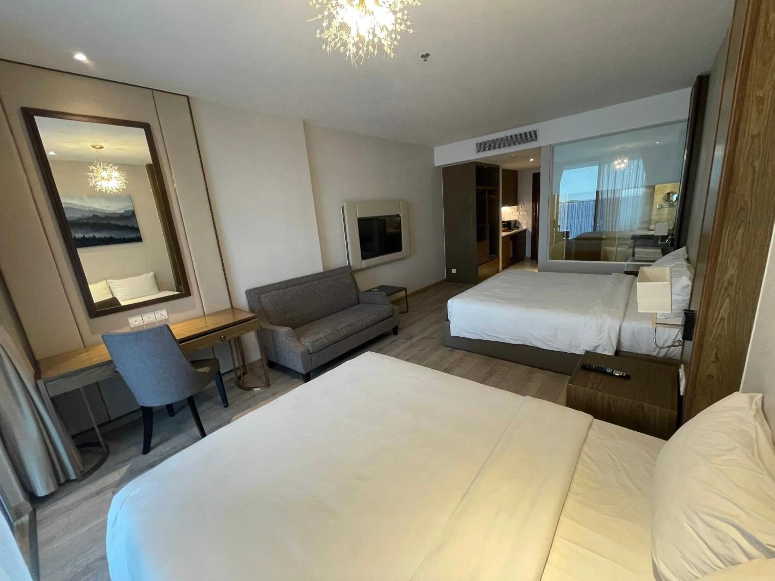 Bed in PANORAMA Condotel by HLG
