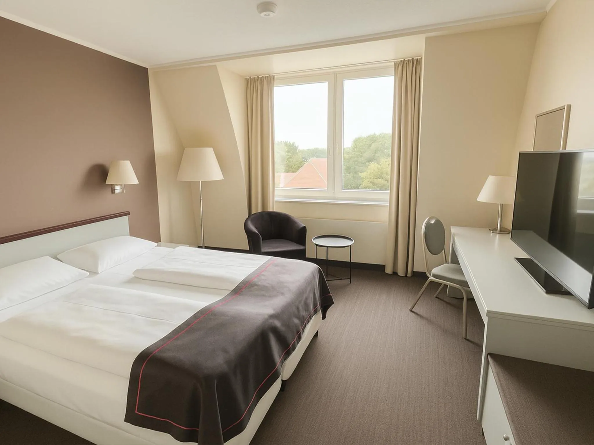 Photo of the whole room, Bed in DORMERO Hotel Dessau-Roßlau