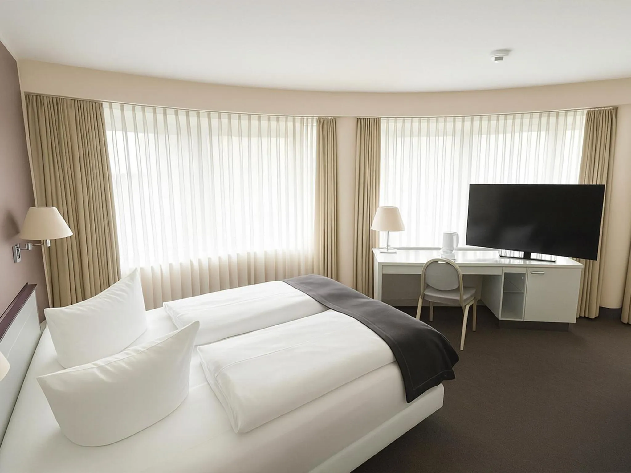 Photo of the whole room, Bed in DORMERO Hotel Dessau-Roßlau