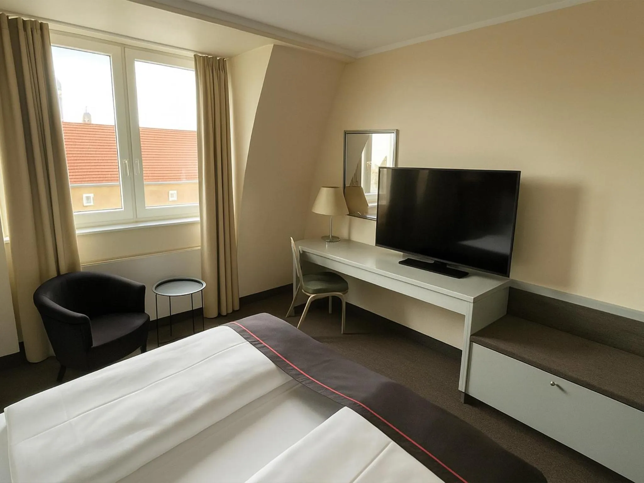 Photo of the whole room, Bed in DORMERO Hotel Dessau-Roßlau