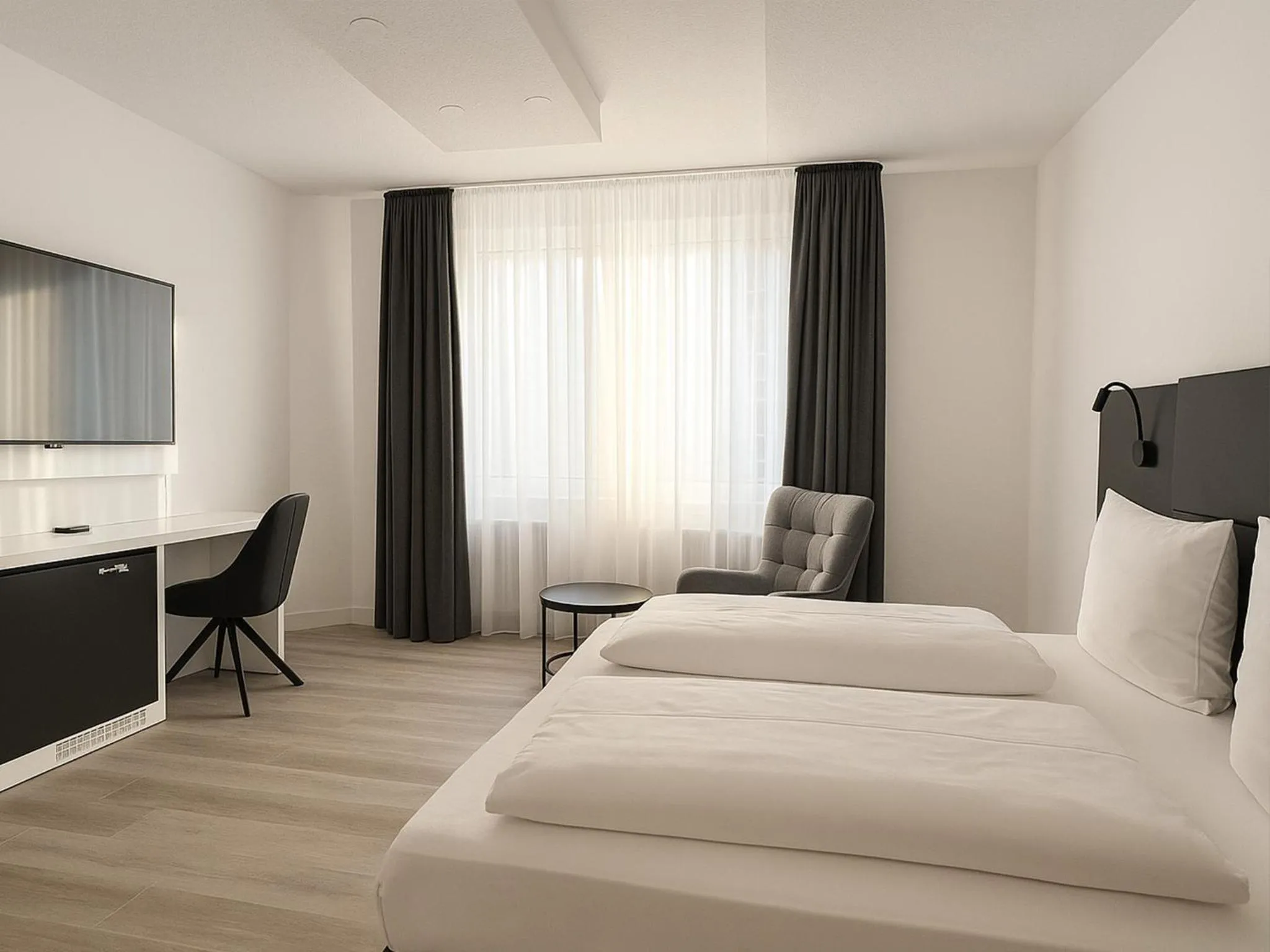 Photo of the whole room, Bed in DORMERO Hotel Dessau-Roßlau