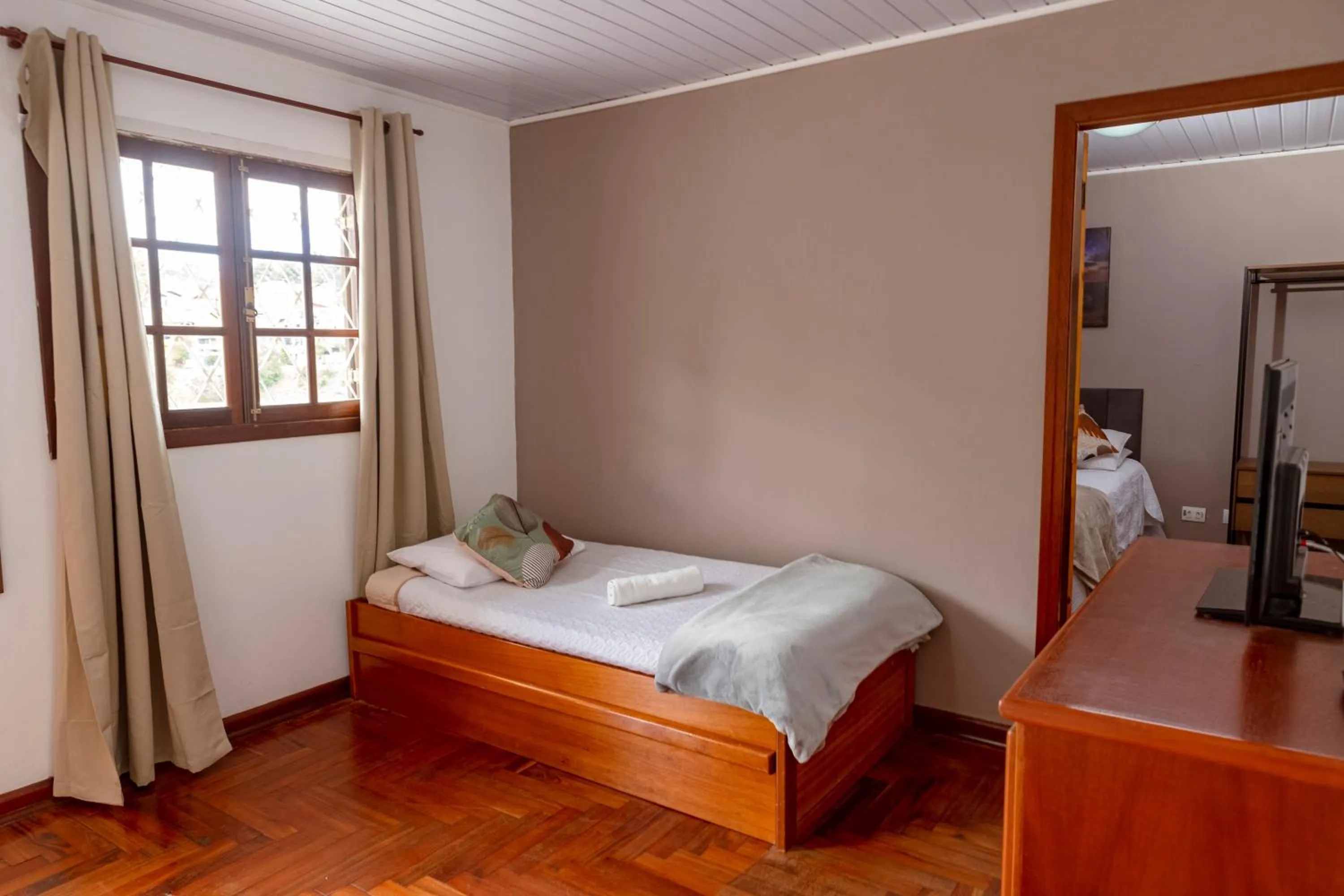 Bed in Pousada Portal da Serra