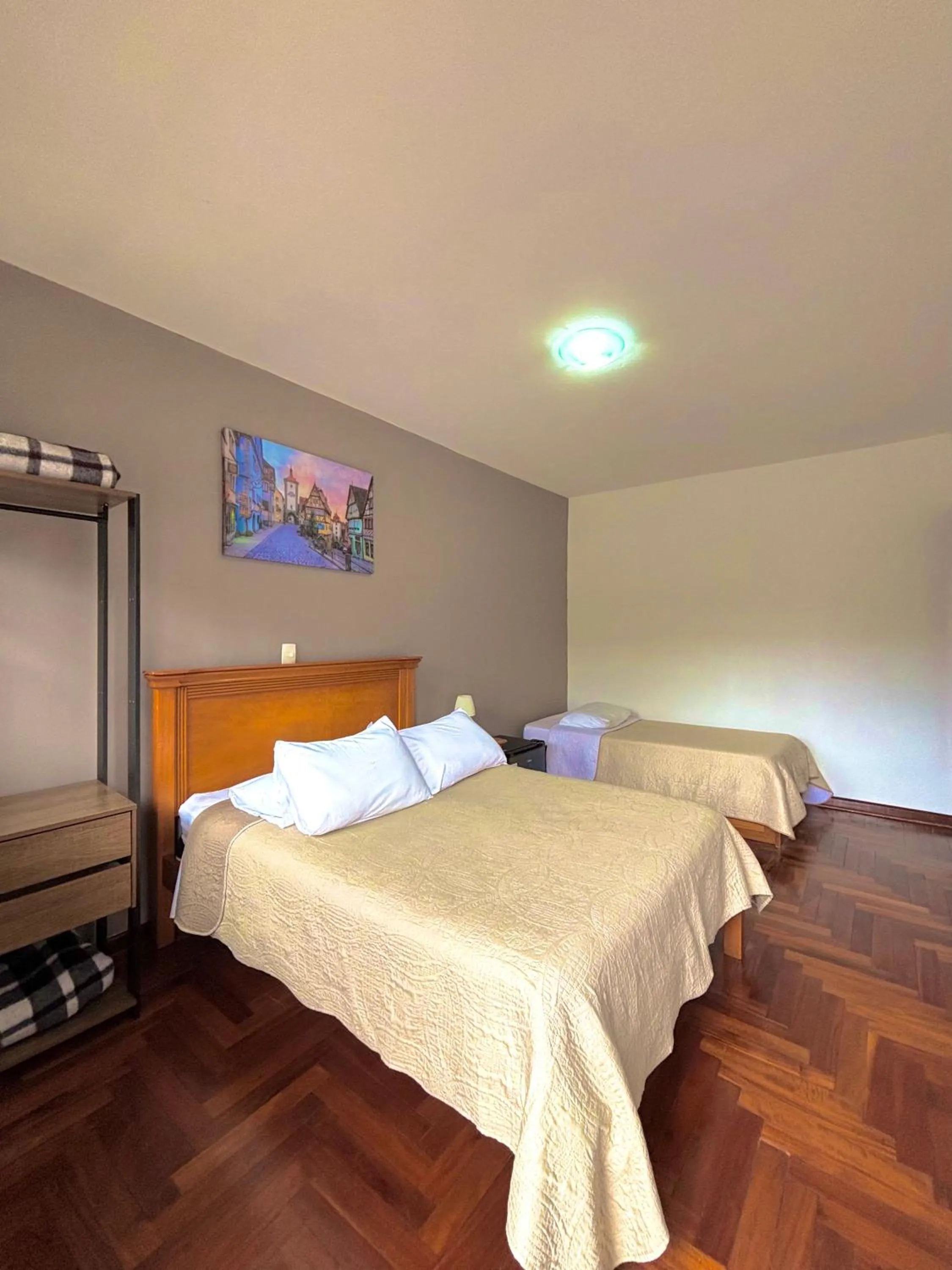 Bed in Pousada Portal da Serra