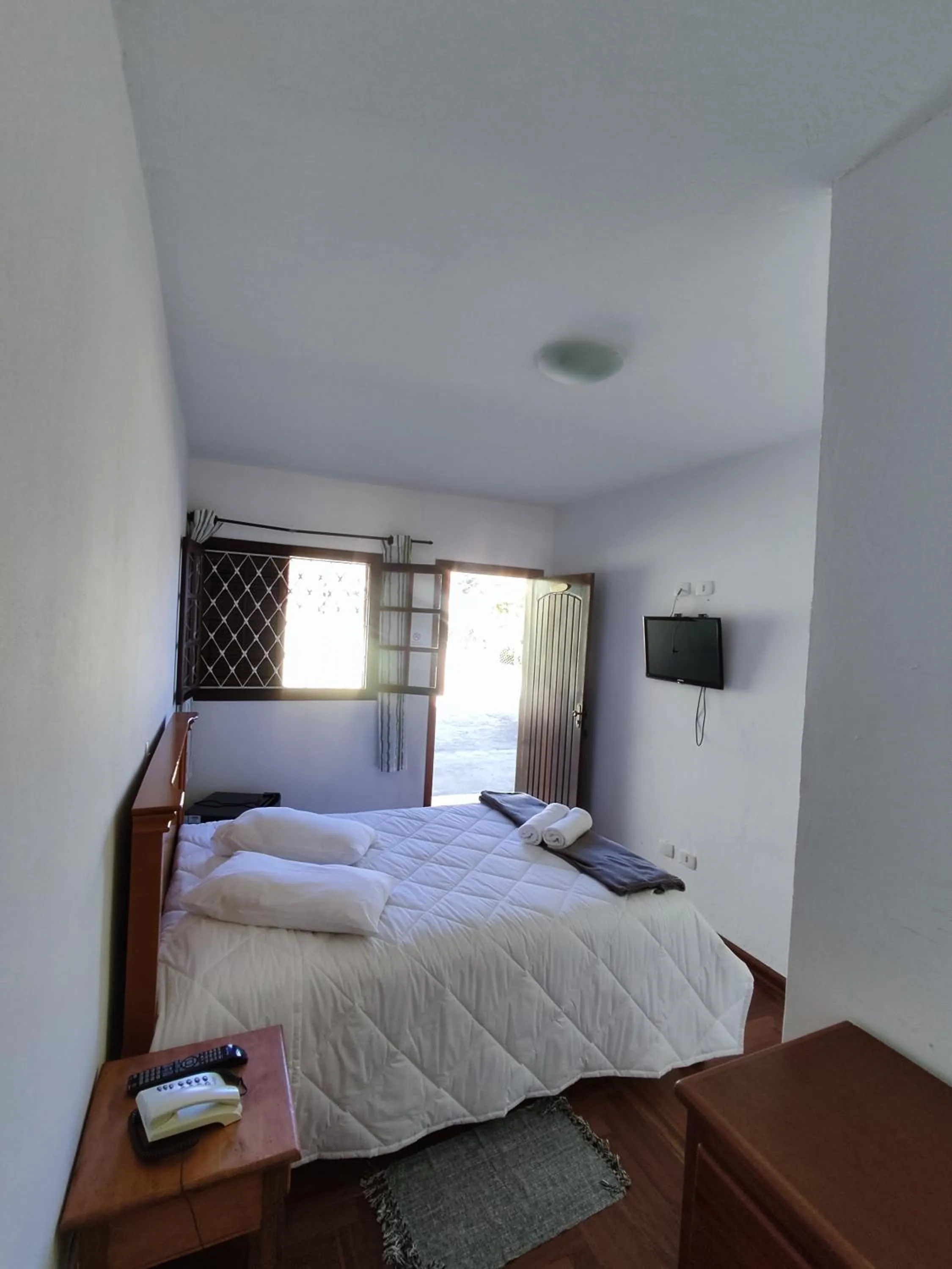 Photo of the whole room, Bed in Pousada Portal da Serra