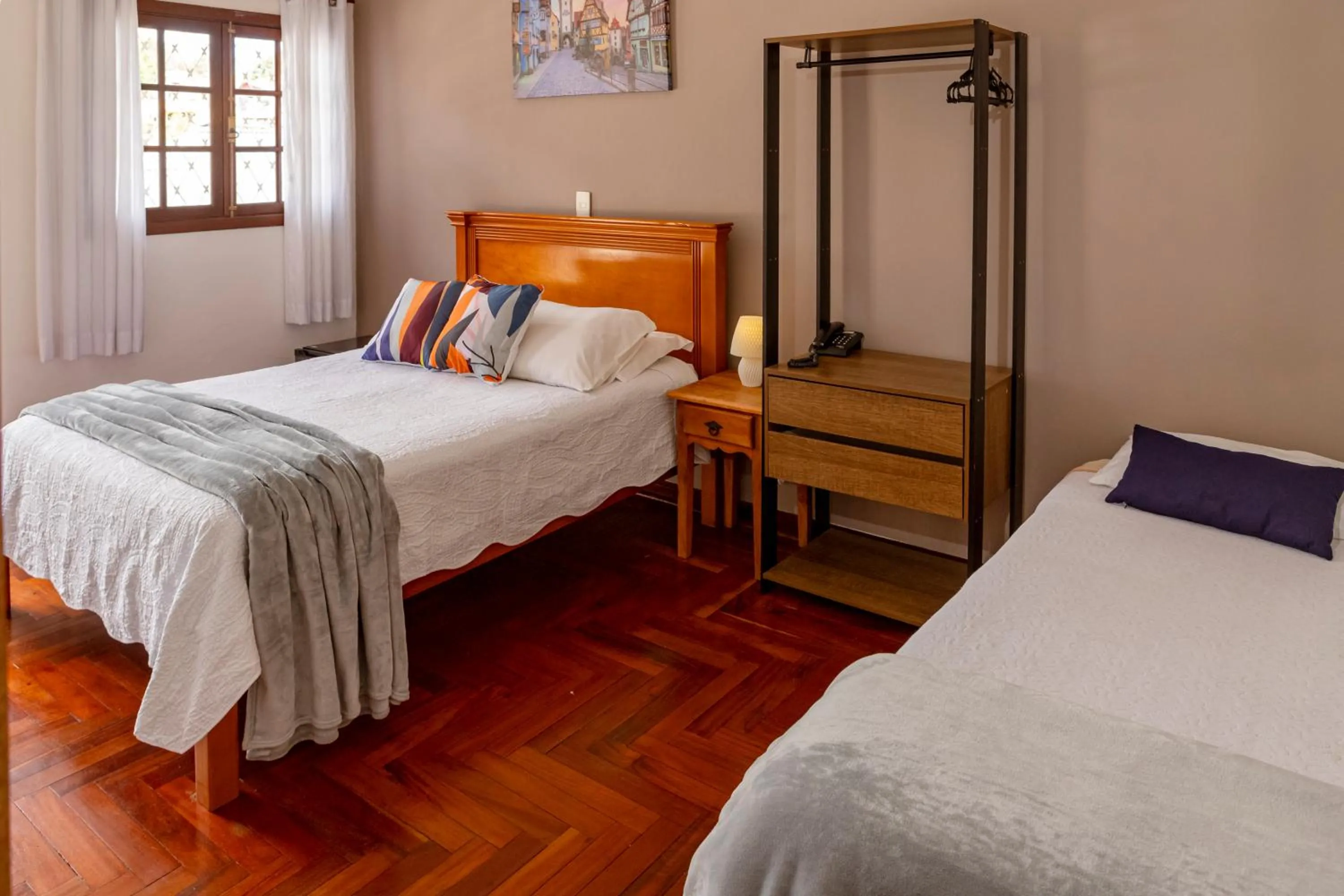 Bed in Pousada Portal da Serra