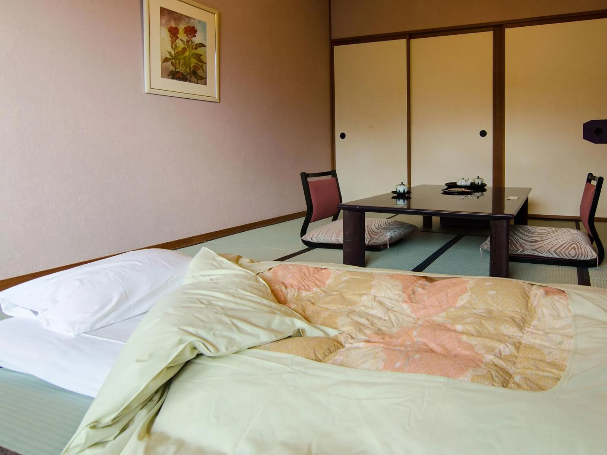 Bed in Hotel Musashiya