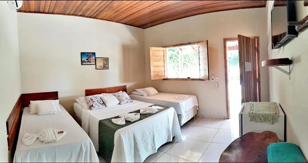 Bed in Pousada do Nondas