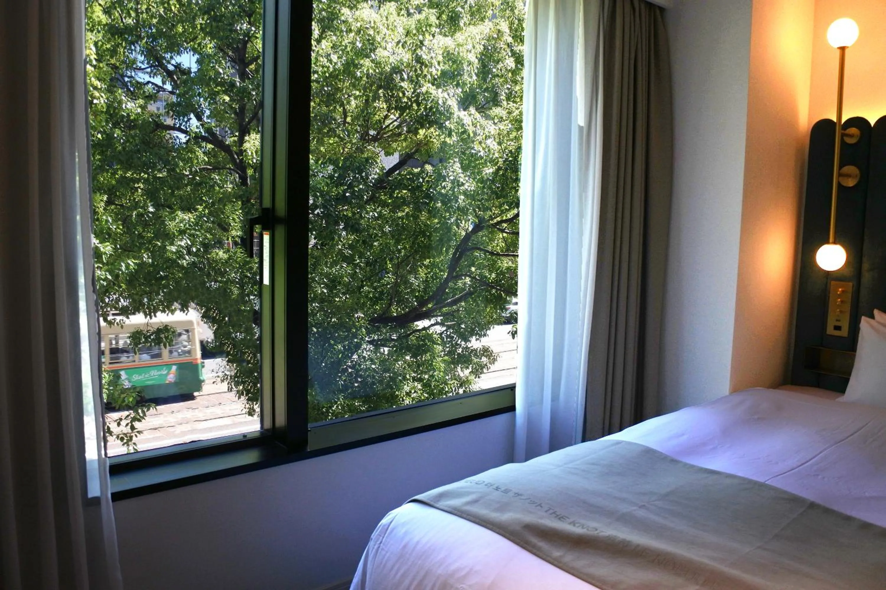 View (from property/room), Bed in The Knot Hiroshima