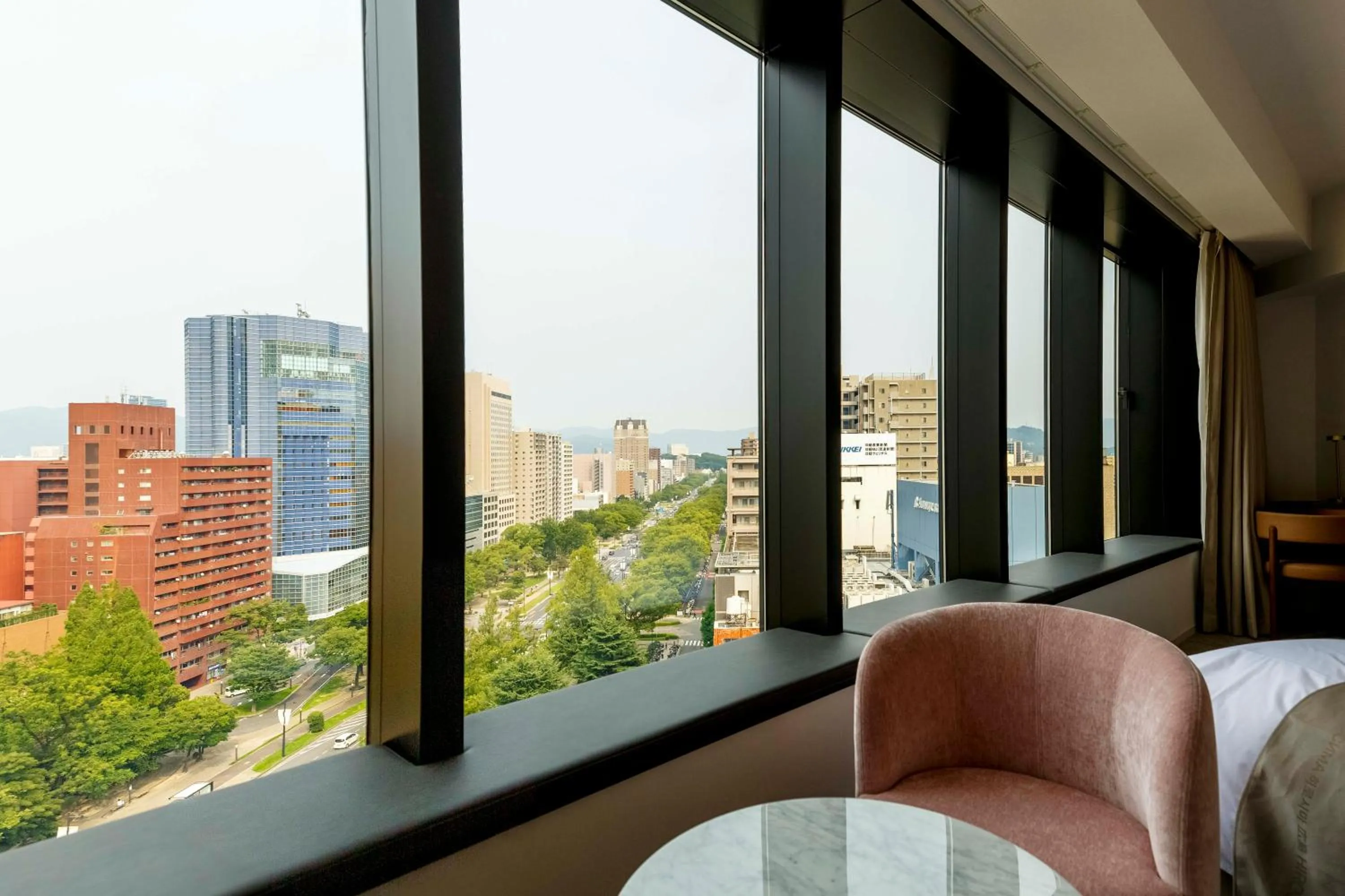 Photo of the whole room, Bed in The Knot Hiroshima