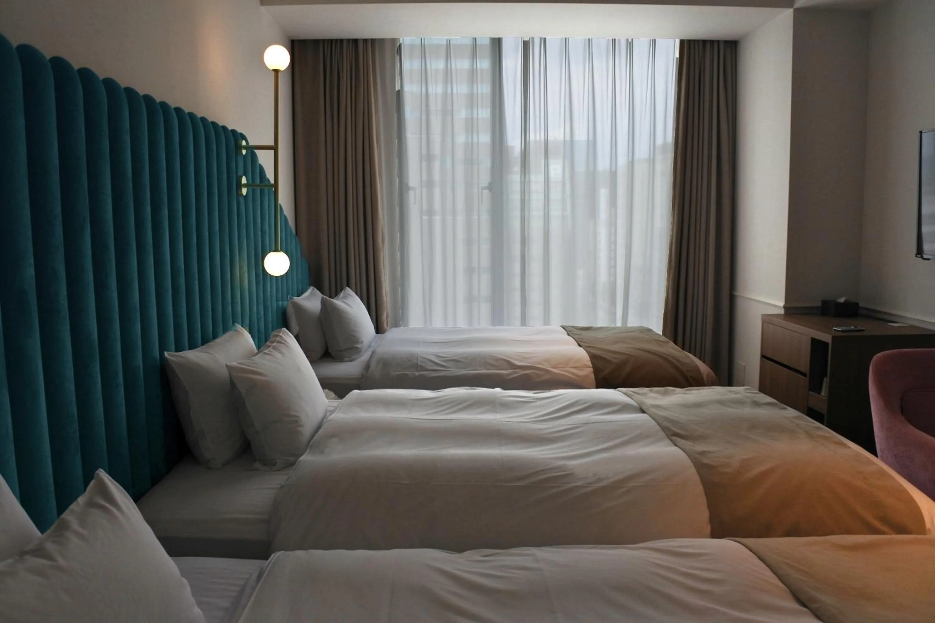 Photo of the whole room, Bed in The Knot Hiroshima