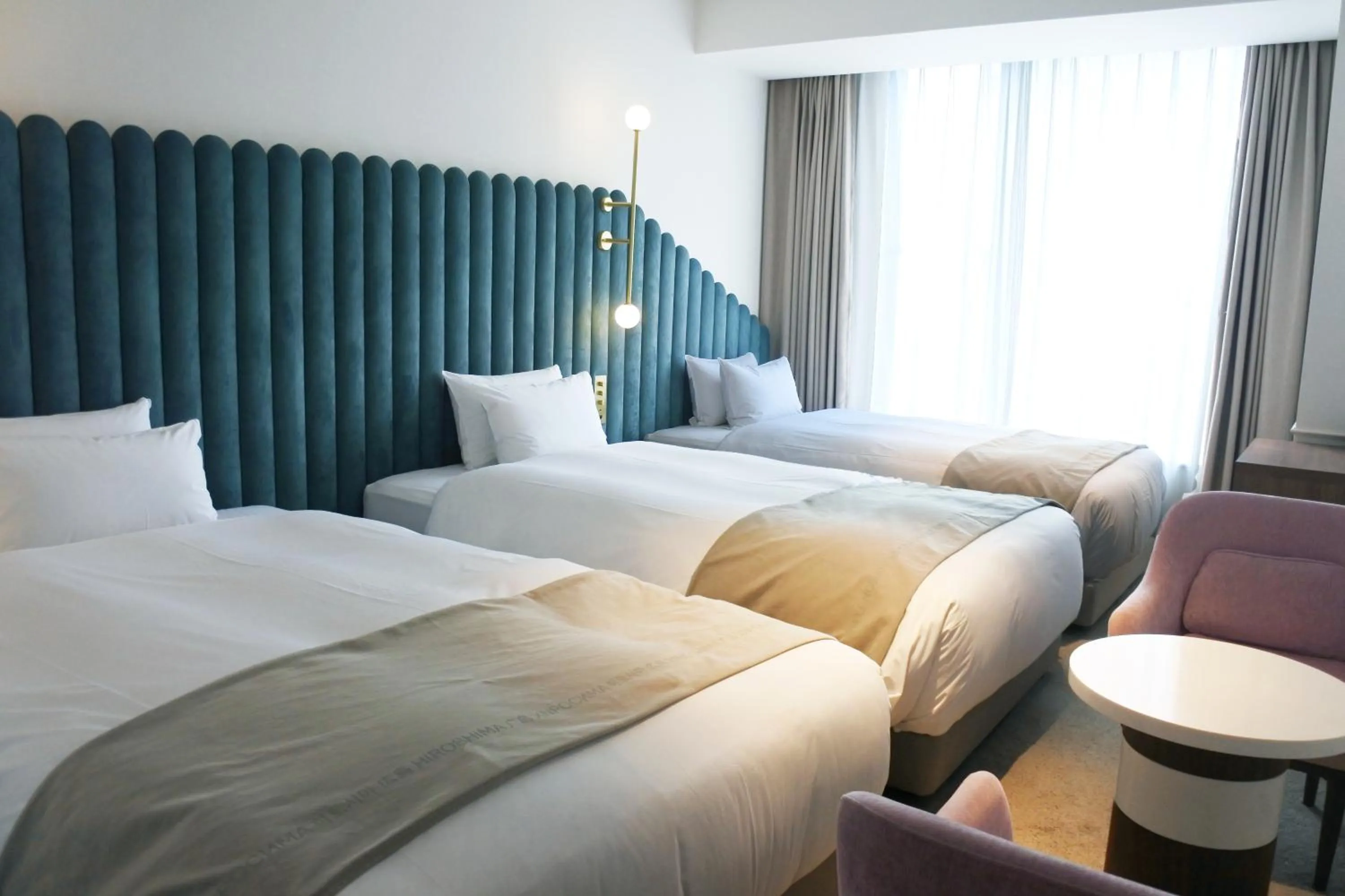 Photo of the whole room, Bed in The Knot Hiroshima