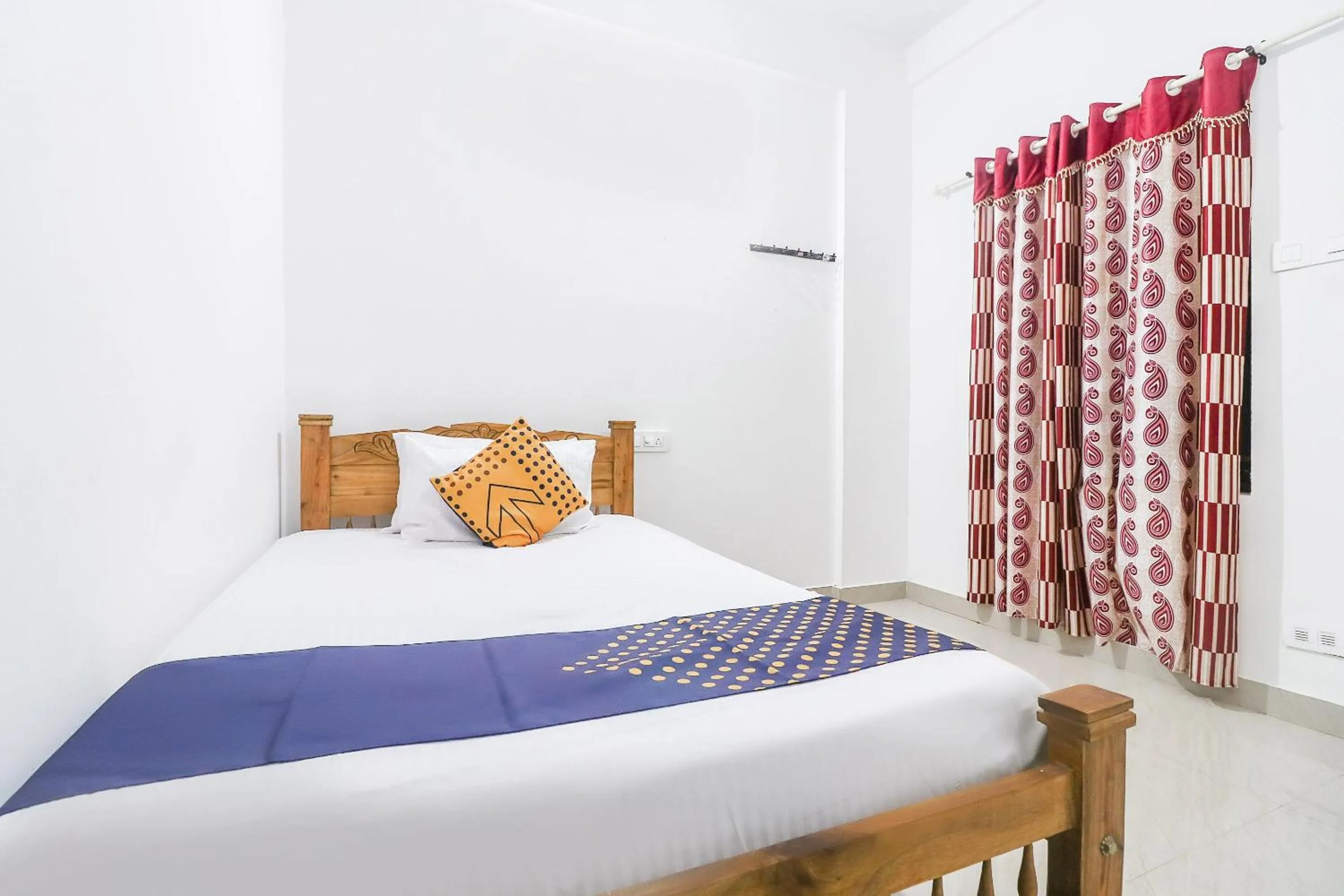 Bedroom, Bed in SPOT ON Rohini Inn Kadampuzha