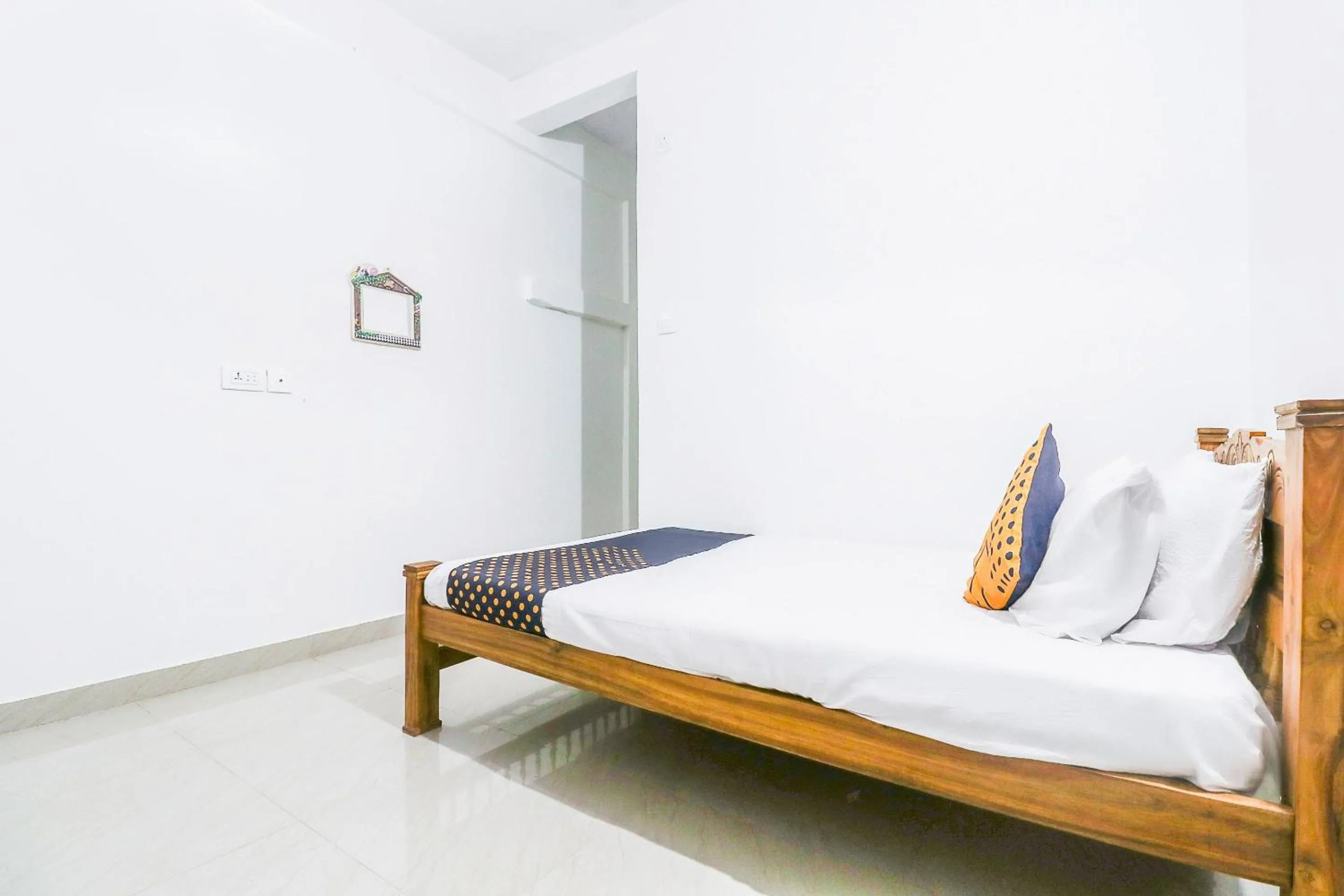 Bedroom, Bed in SPOT ON Rohini Inn Kadampuzha