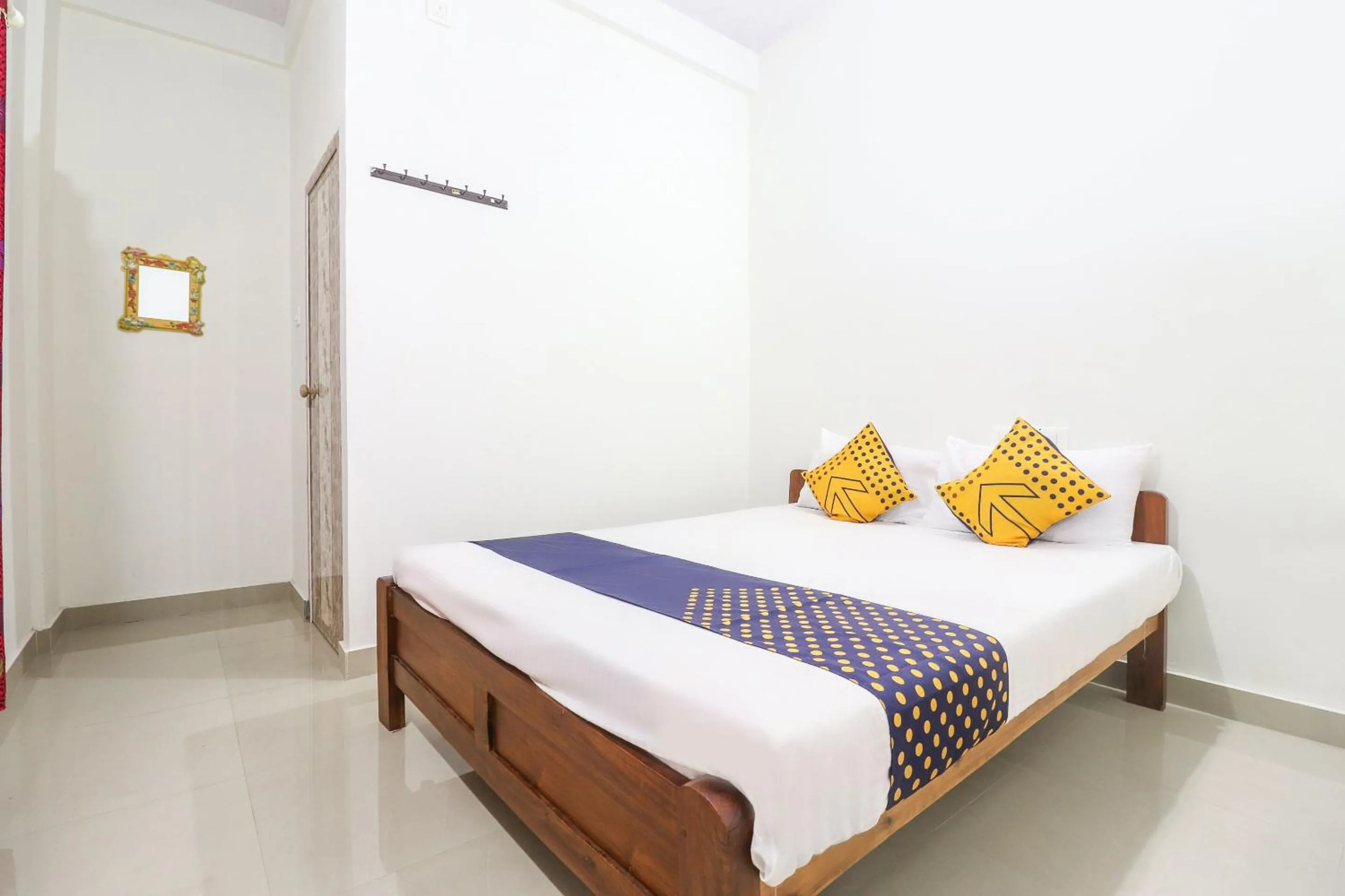 Bedroom, Bed in SPOT ON Rohini Inn Kadampuzha