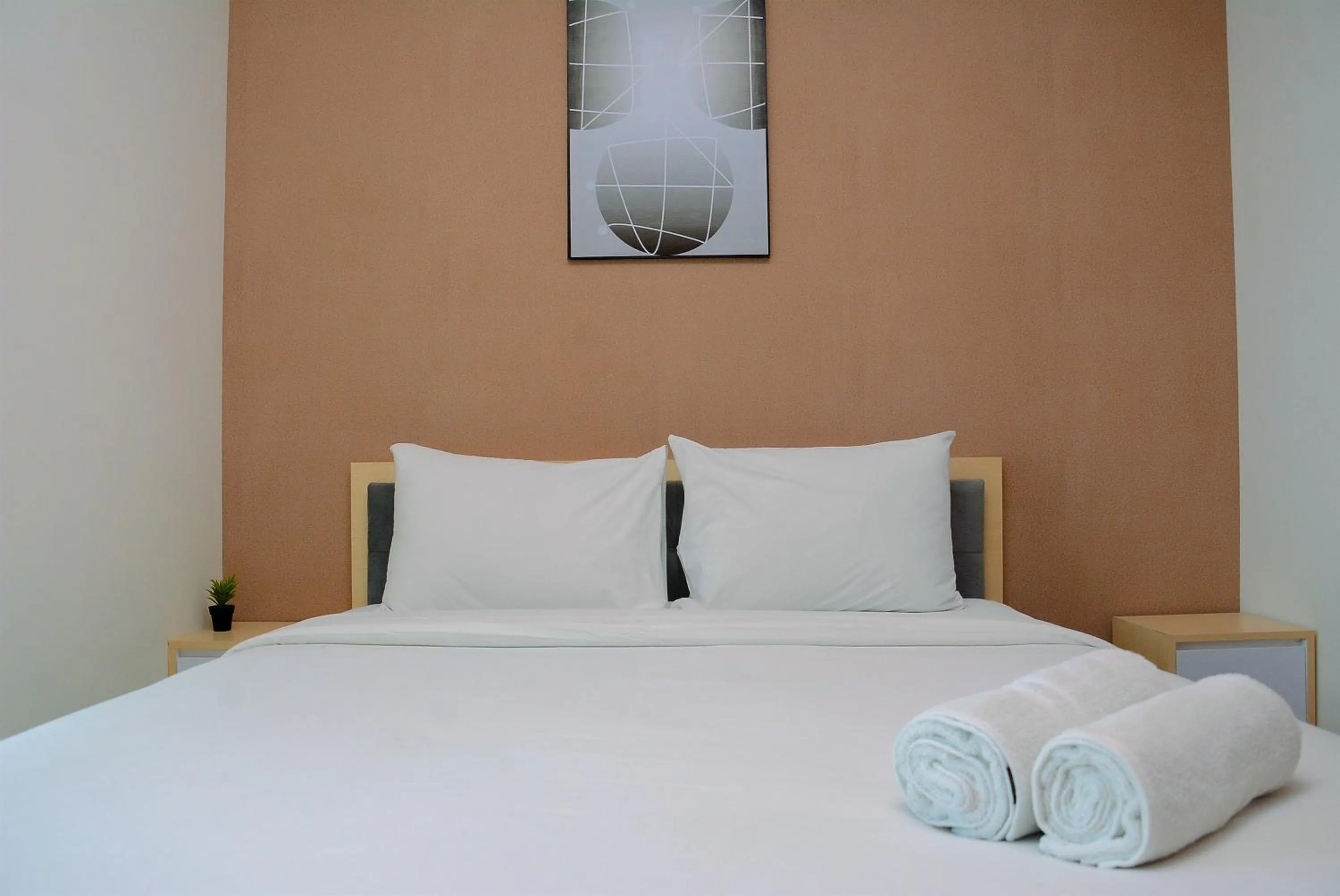 One-Bedroom Apartment in Minimalist and Homey 1BR Grand Kamala Lagoon Apartment By Travelio