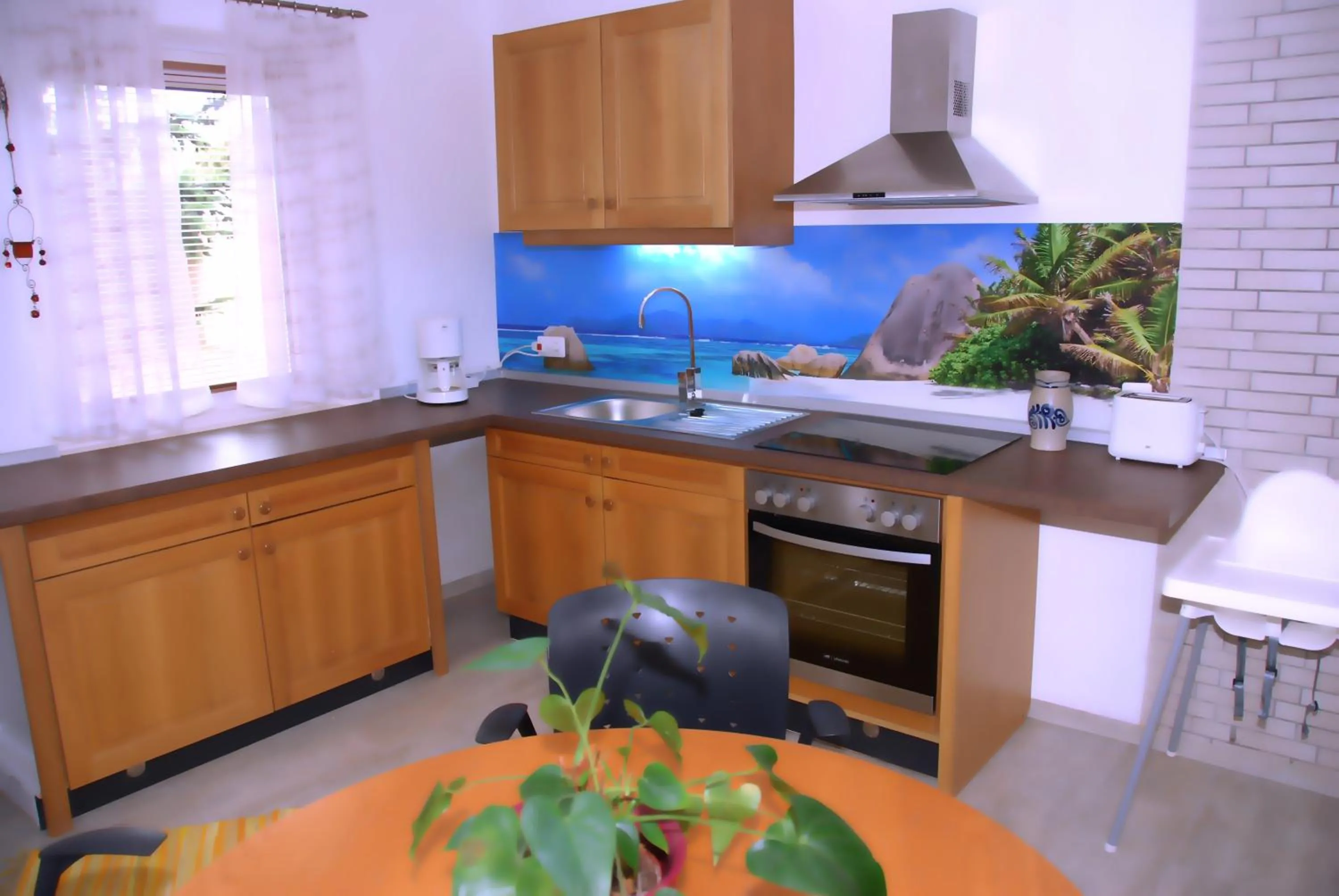Kitchen or kitchenette in ambiente solutions apartments