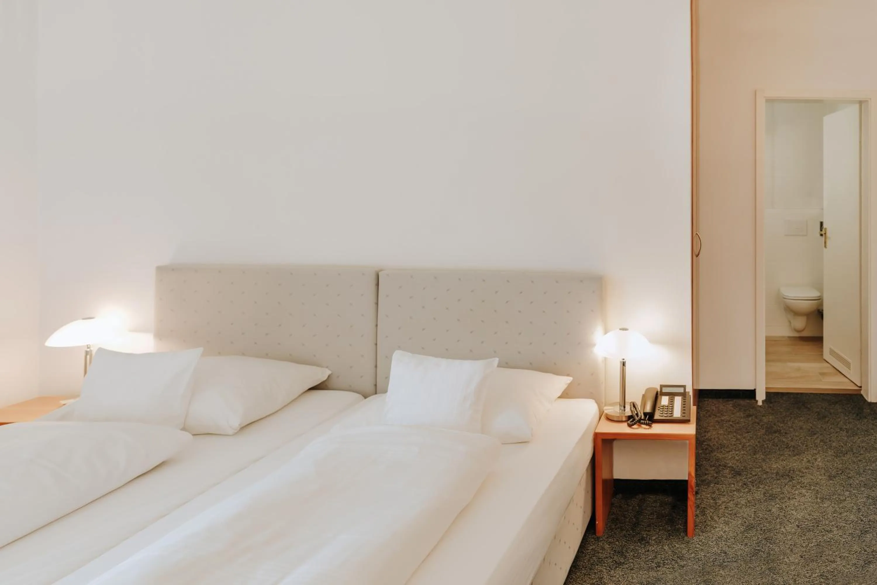 Bed in Huber's Hotel