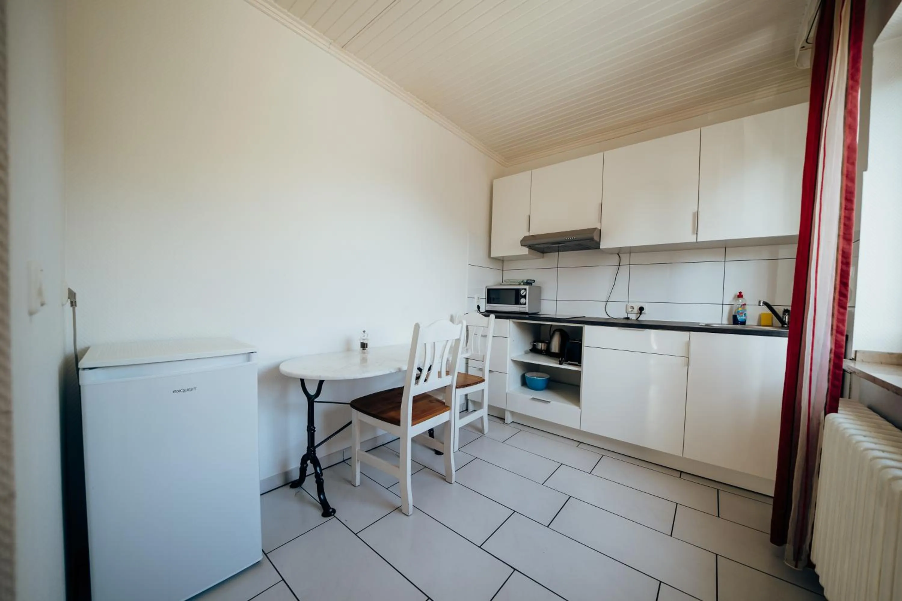 Kitchen or kitchenette in guestified BARBAROSSA Hotel