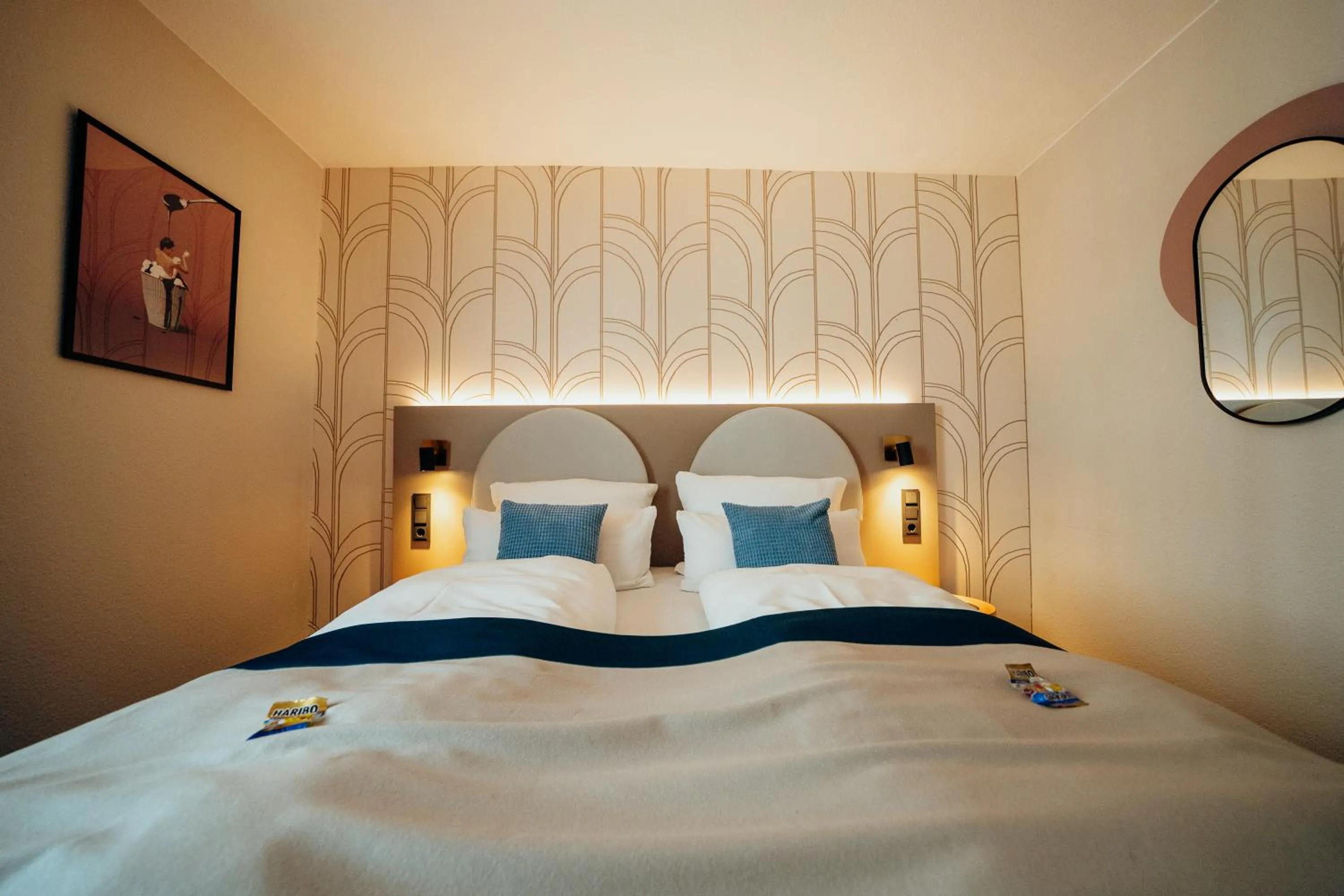 Bed in guestified BARBAROSSA Hotel