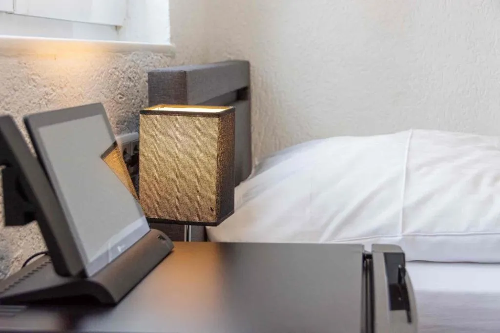 Bed in Cocco-Bello Smart Check-in Hotel