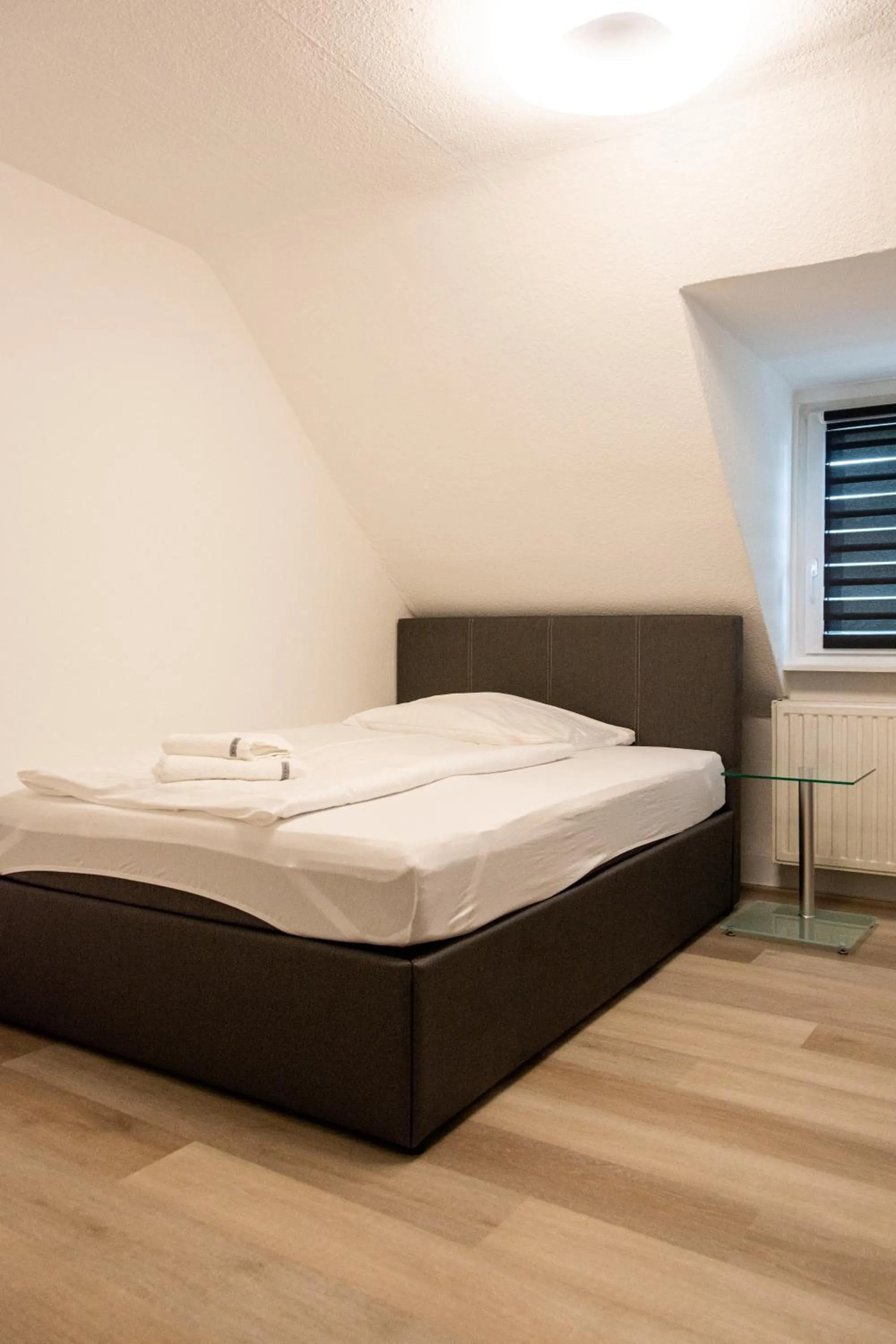 Bed in Cocco-Bello Smart Check-in Hotel