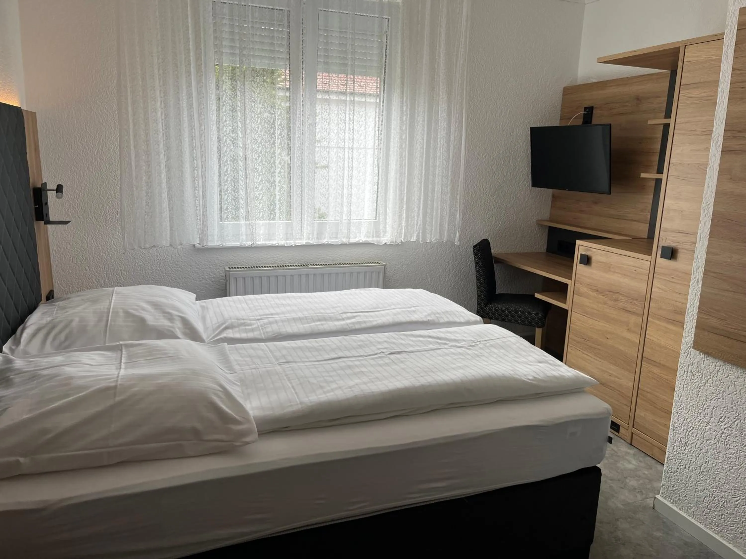 Bed in Cocco-Bello Smart Check-in Hotel