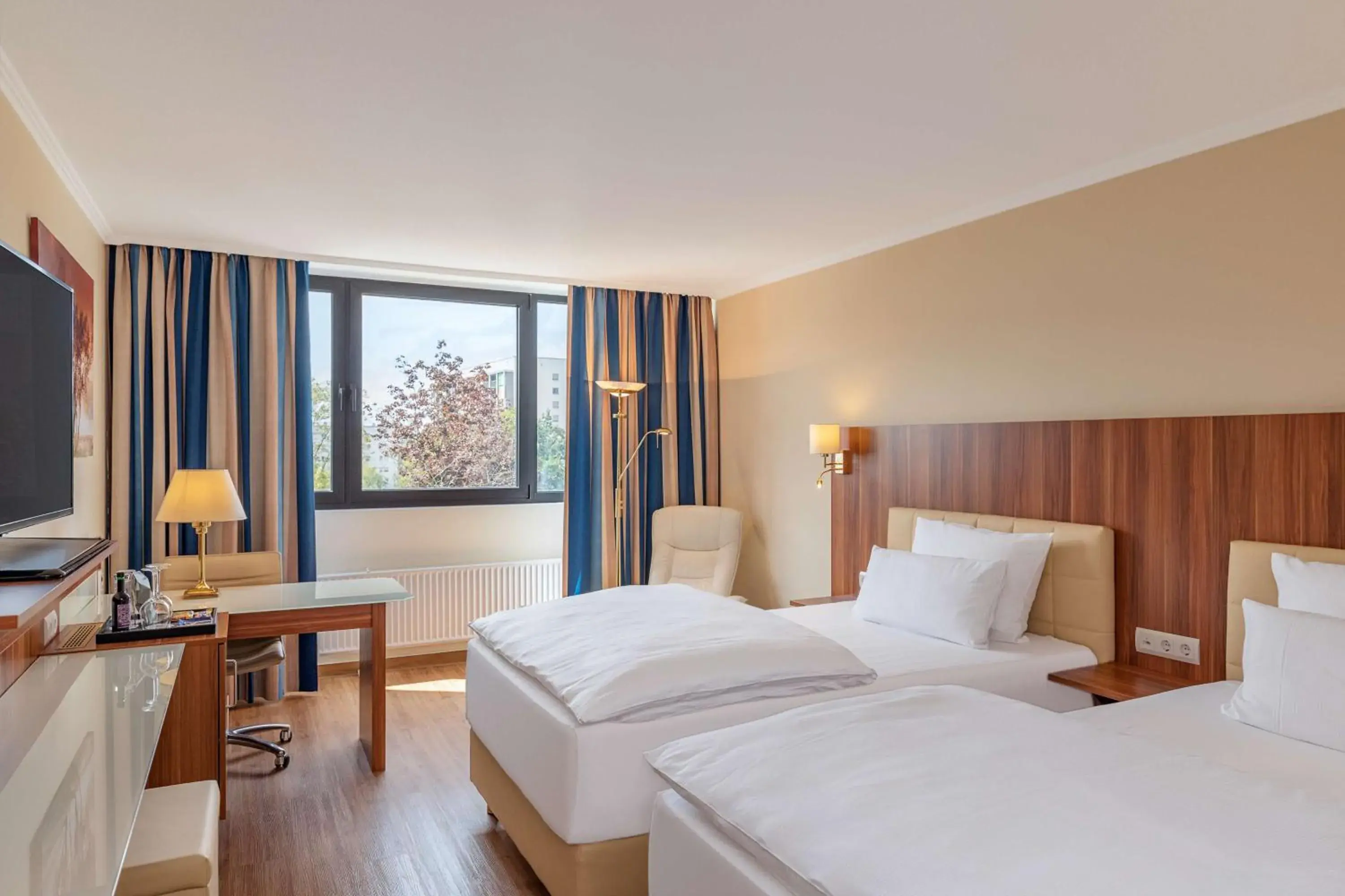 Photo of the whole room, Bed in NH Ingolstadt Photo of the whole room, Bed in NH Ingolstadt