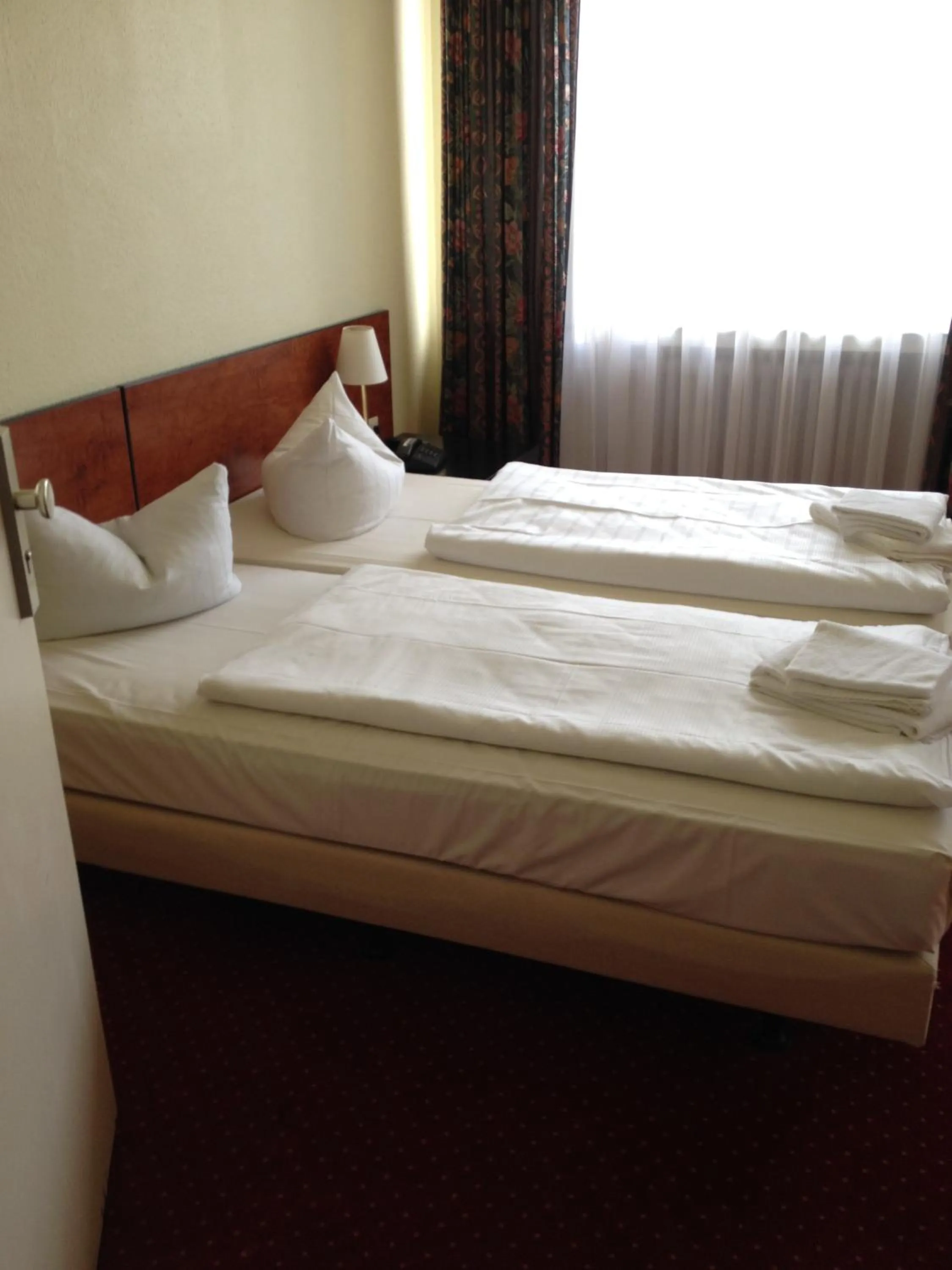 Bed in Domo Hotel Mondial