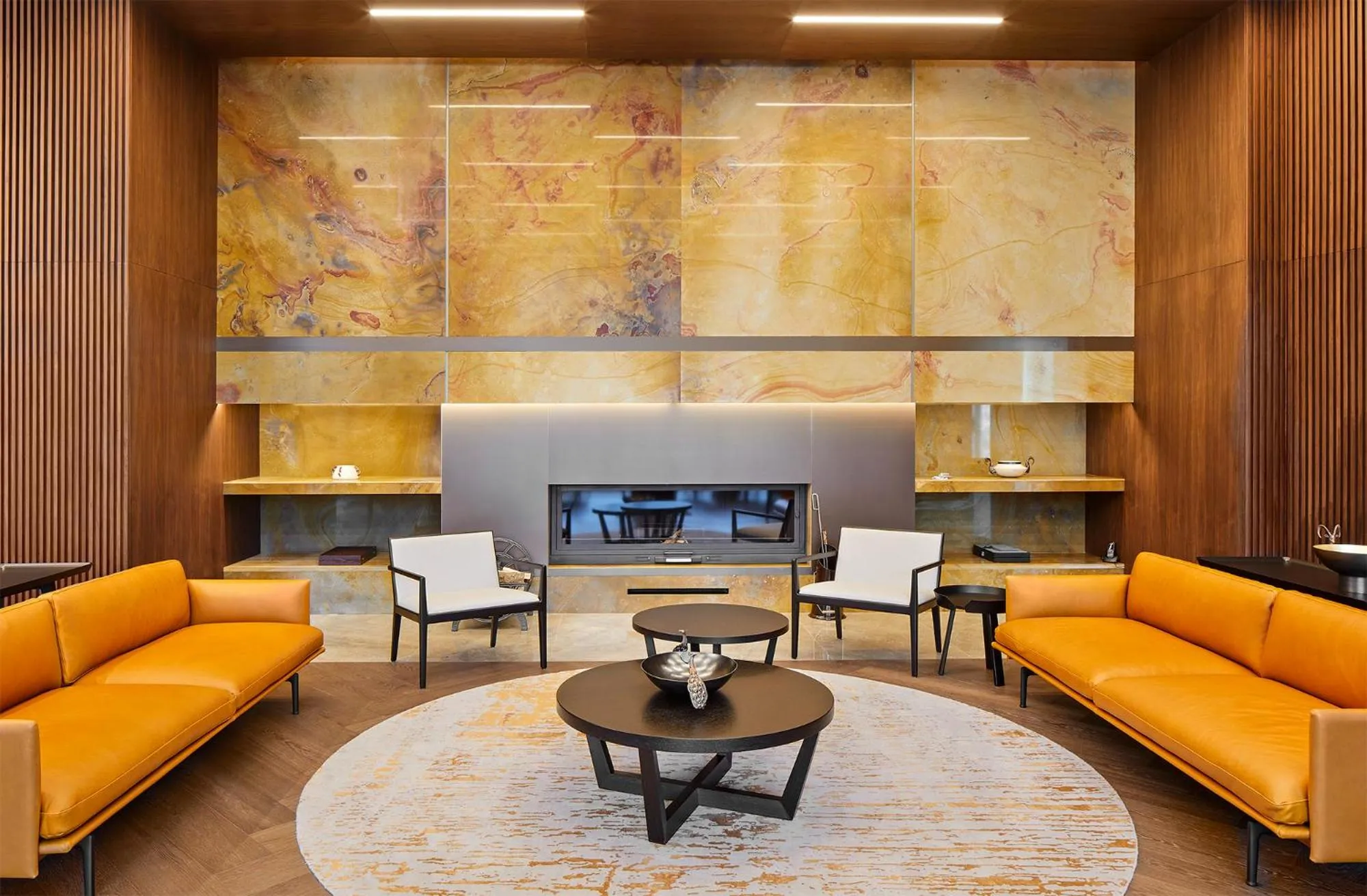 Communal lounge/ TV room in Ricosta Hotel