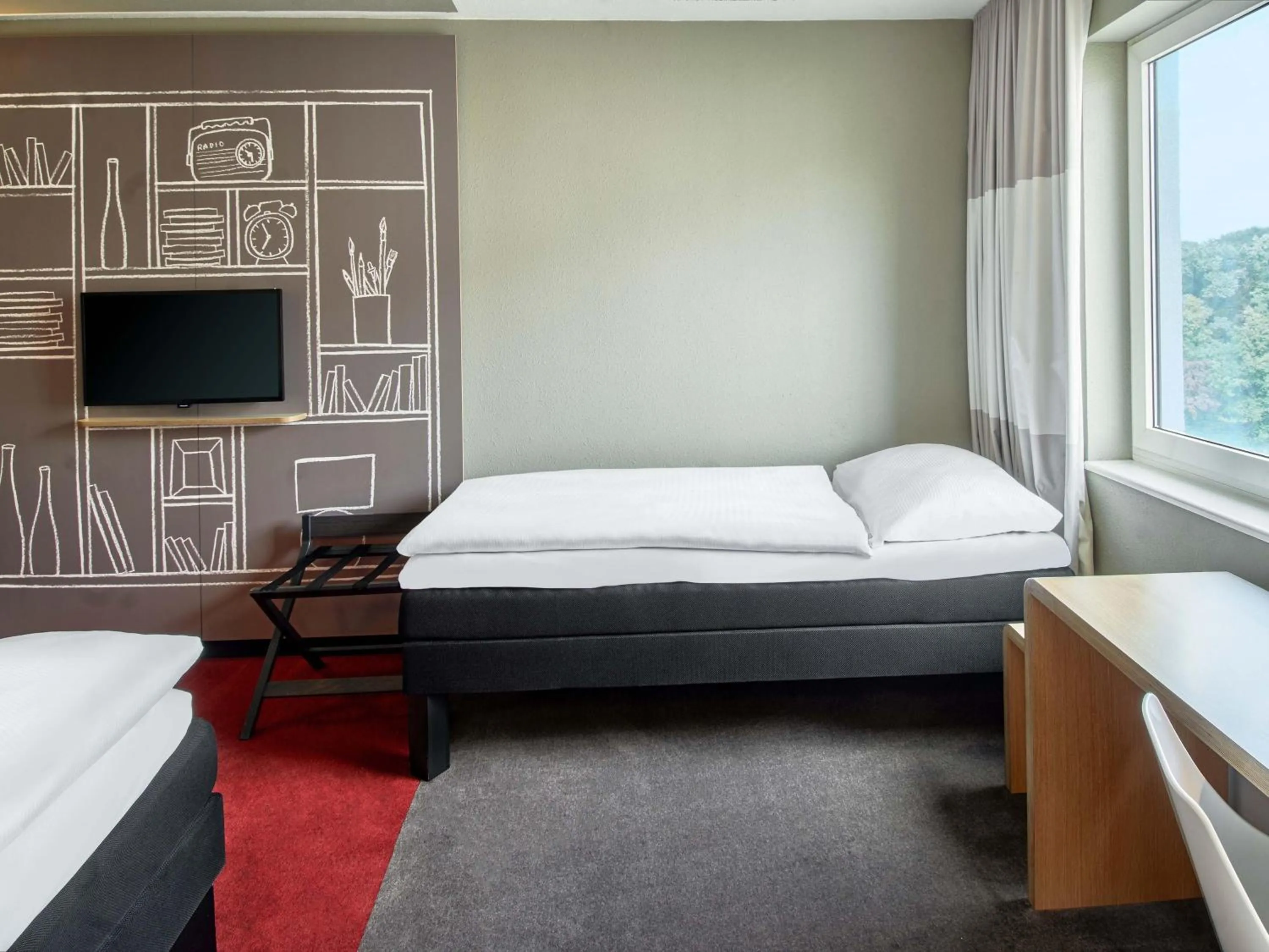 Photo of the whole room, Bed in B&B Hotel Frankfurt-Messe