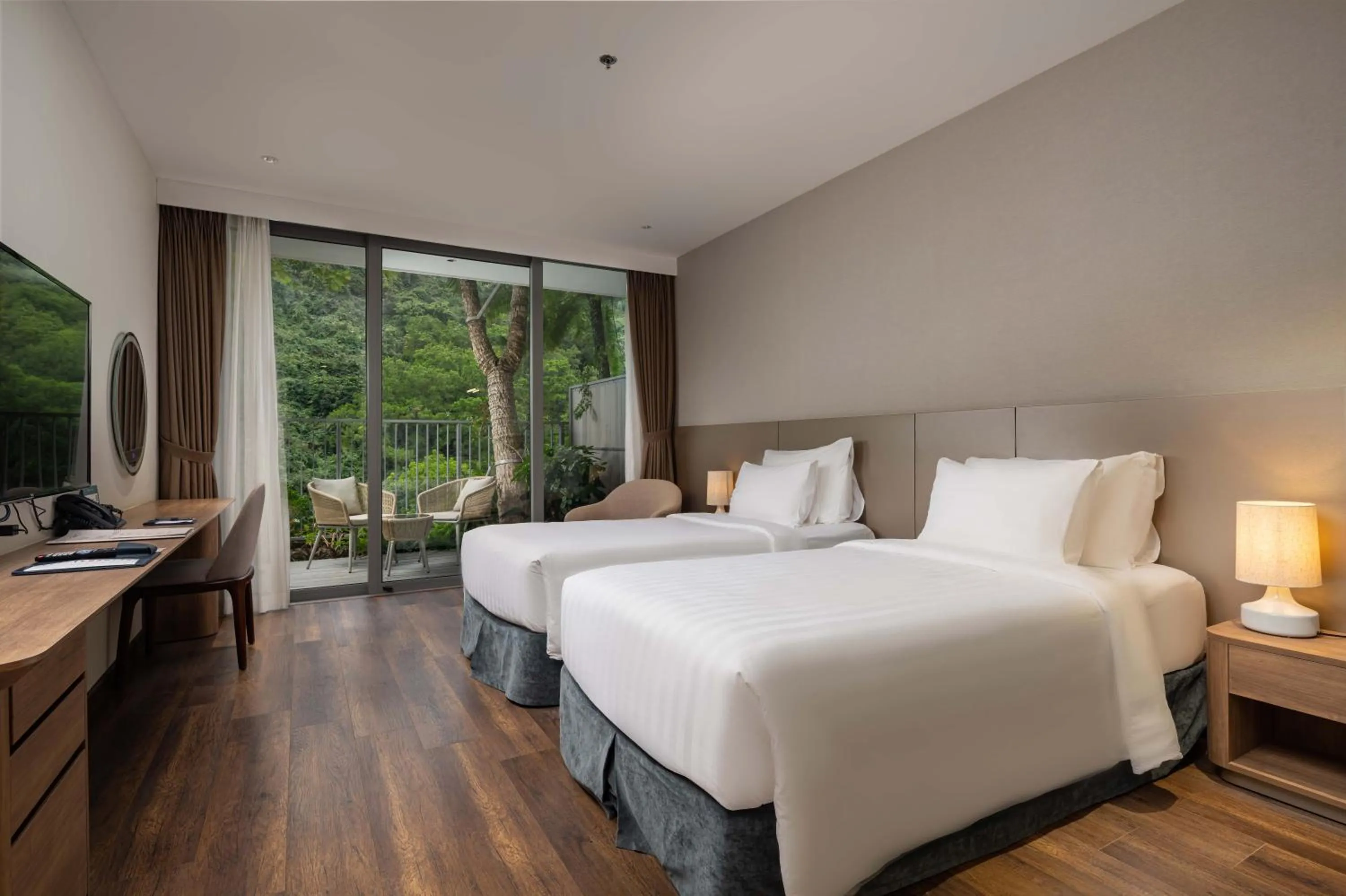 Bed in Flamingo Cát Bà Resort Managed by Flamingo Hotels & Resorts