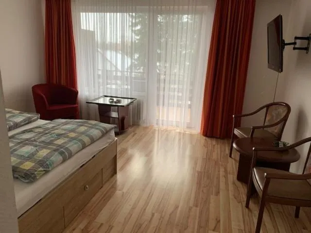 Photo of the whole room, Bed in Naturkost-Hotel Harz