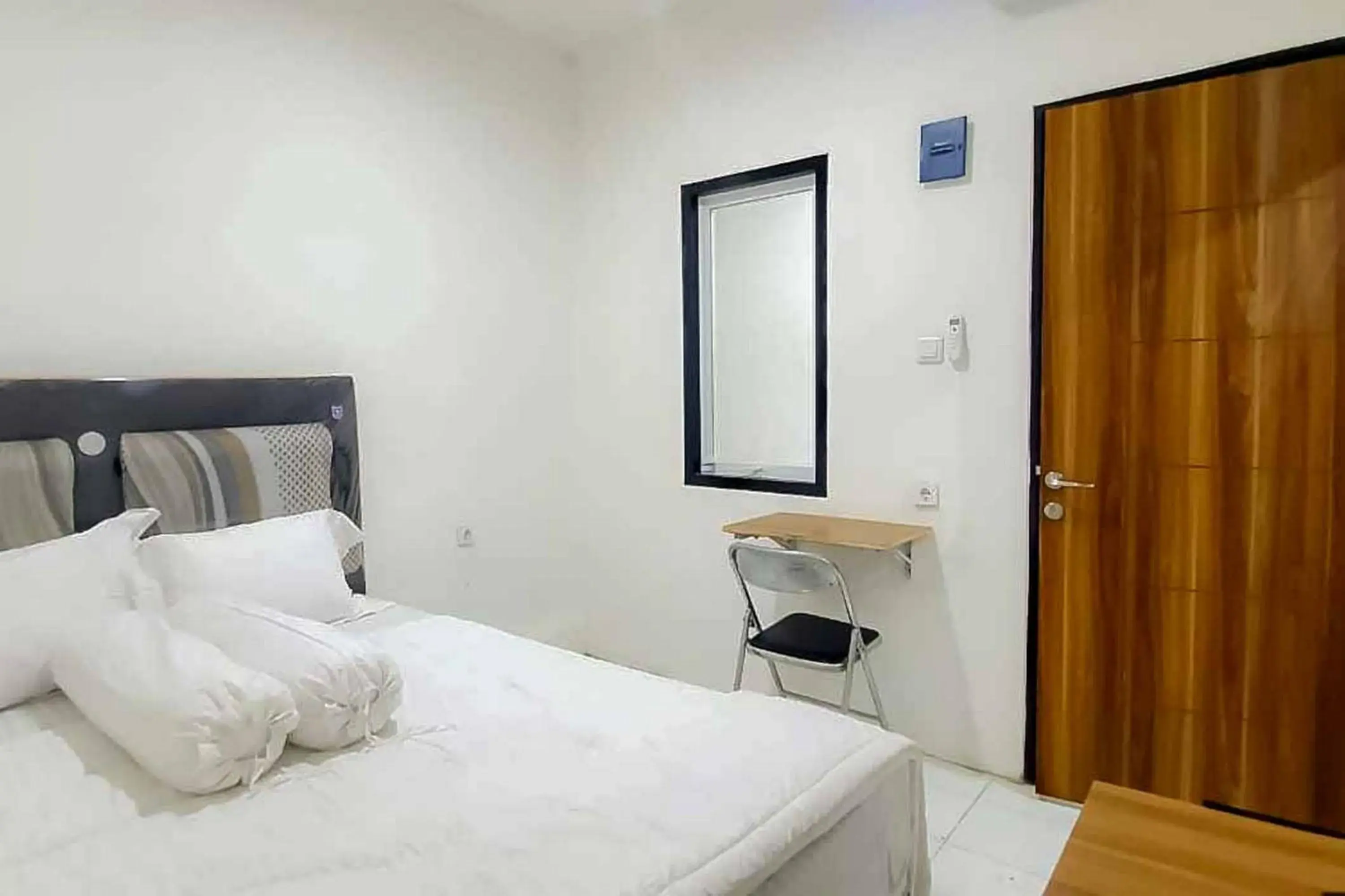 Bed in Maminoti Syariah Residence Mitra RedDoorz Bed in Maminoti Syariah Residence Mitra RedDoorz