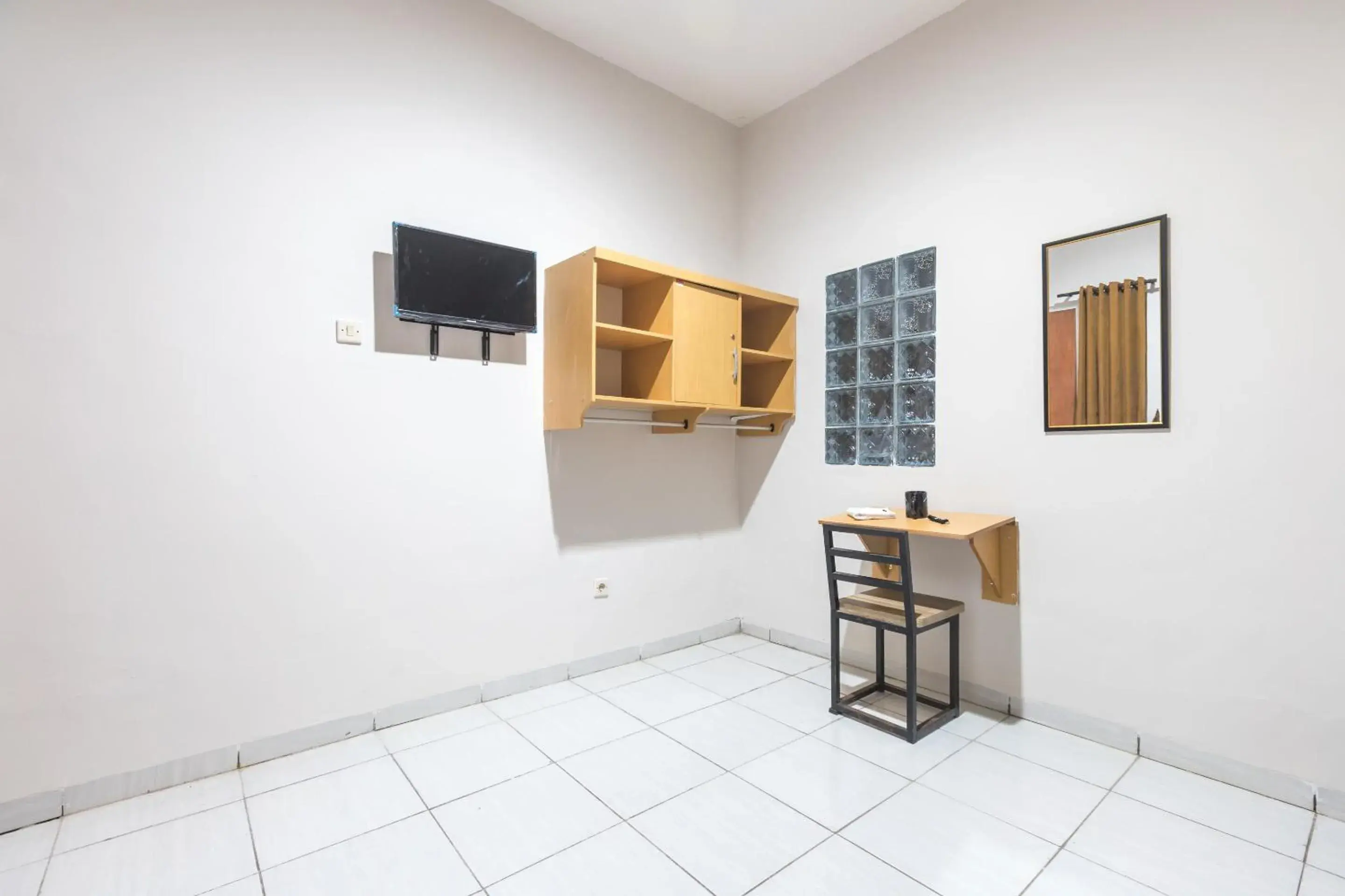 Bedroom in Maminoti Syariah Residence Mitra RedDoorz Bedroom in Maminoti Syariah Residence Mitra RedDoorz