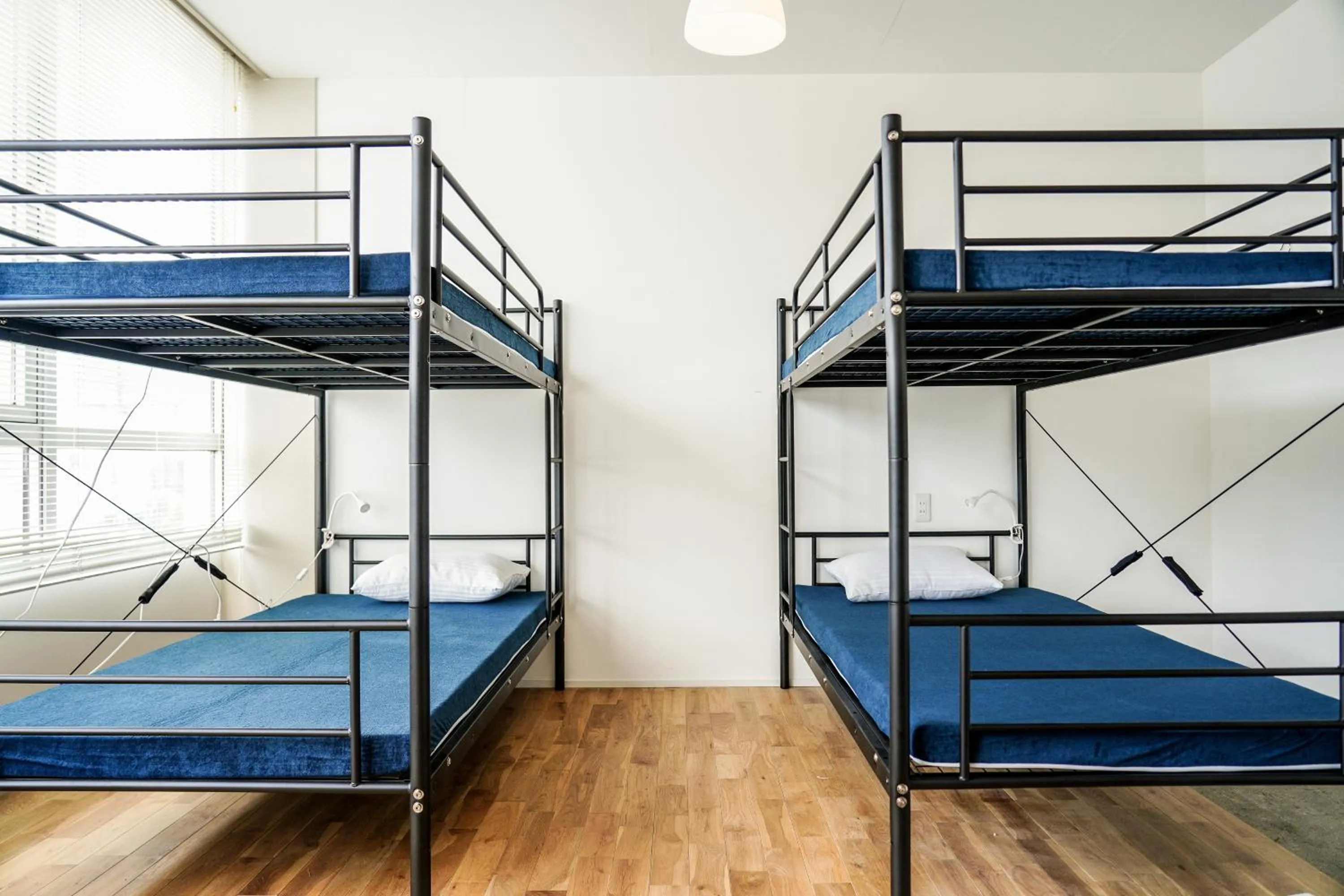 Bed in 商店街で暮らすように泊まる-アラシマホステル-