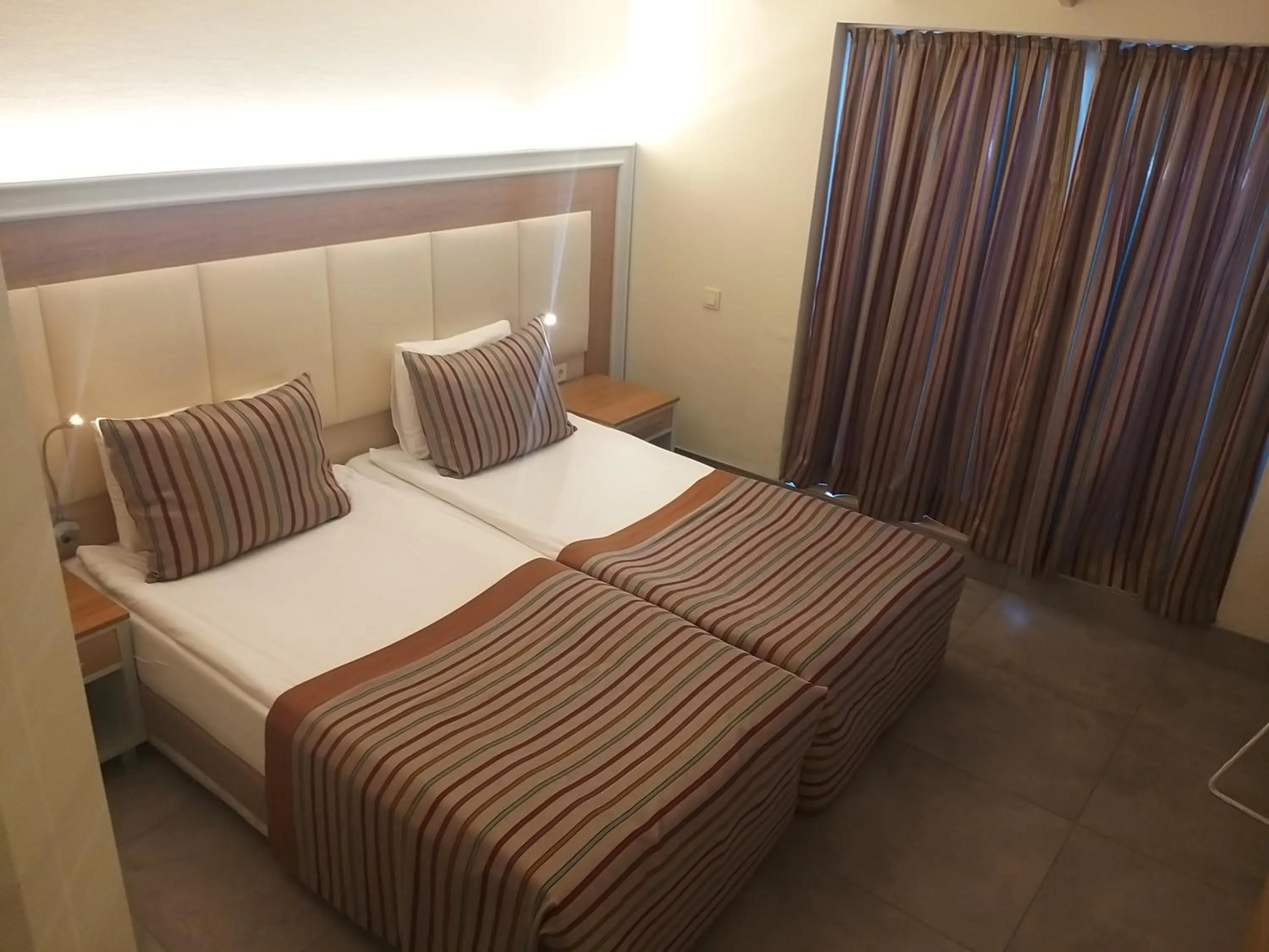 Bedroom, Bed in AQI Pegasos Resort