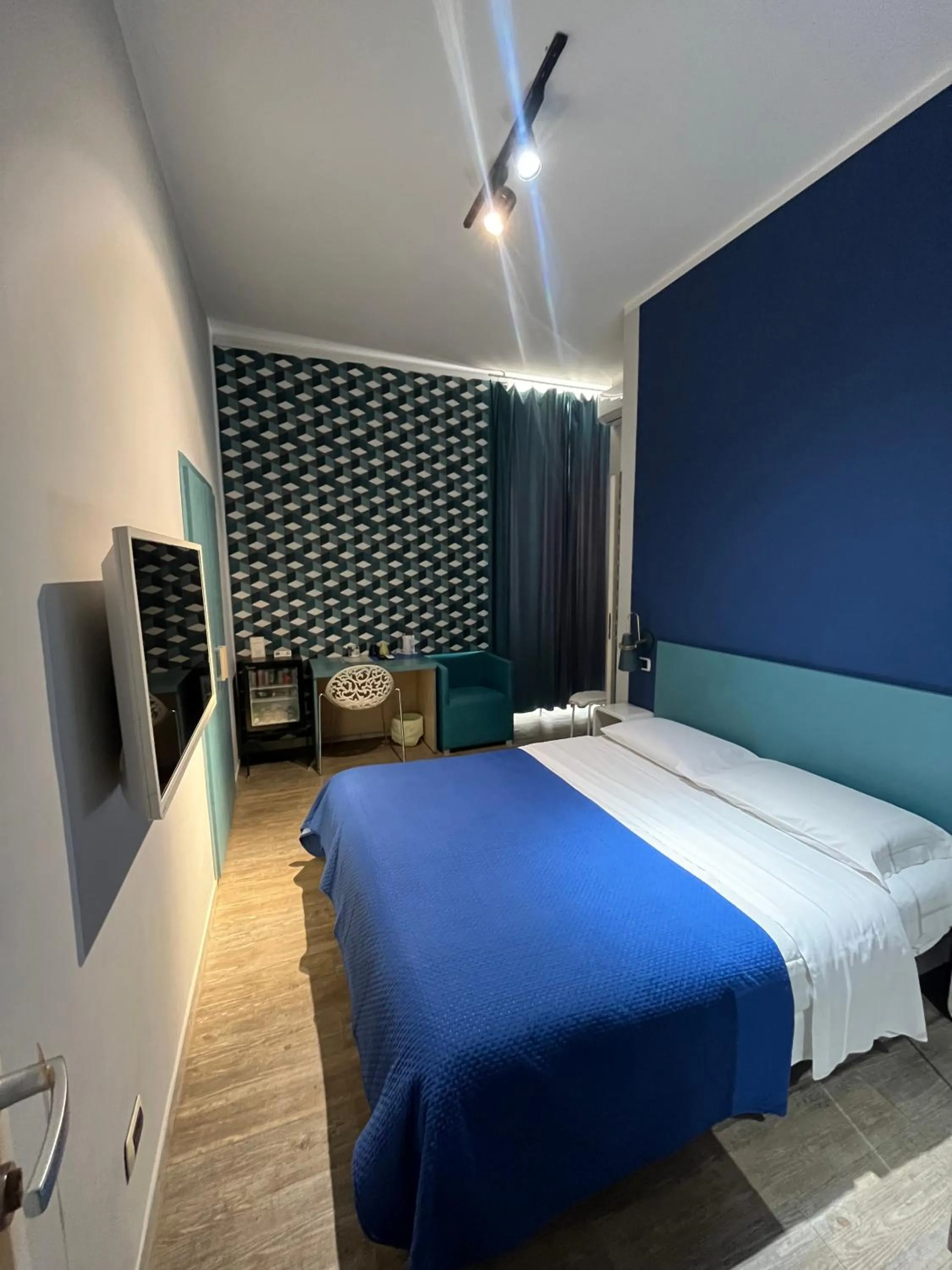 Bed in H Rooms boutique Hotel