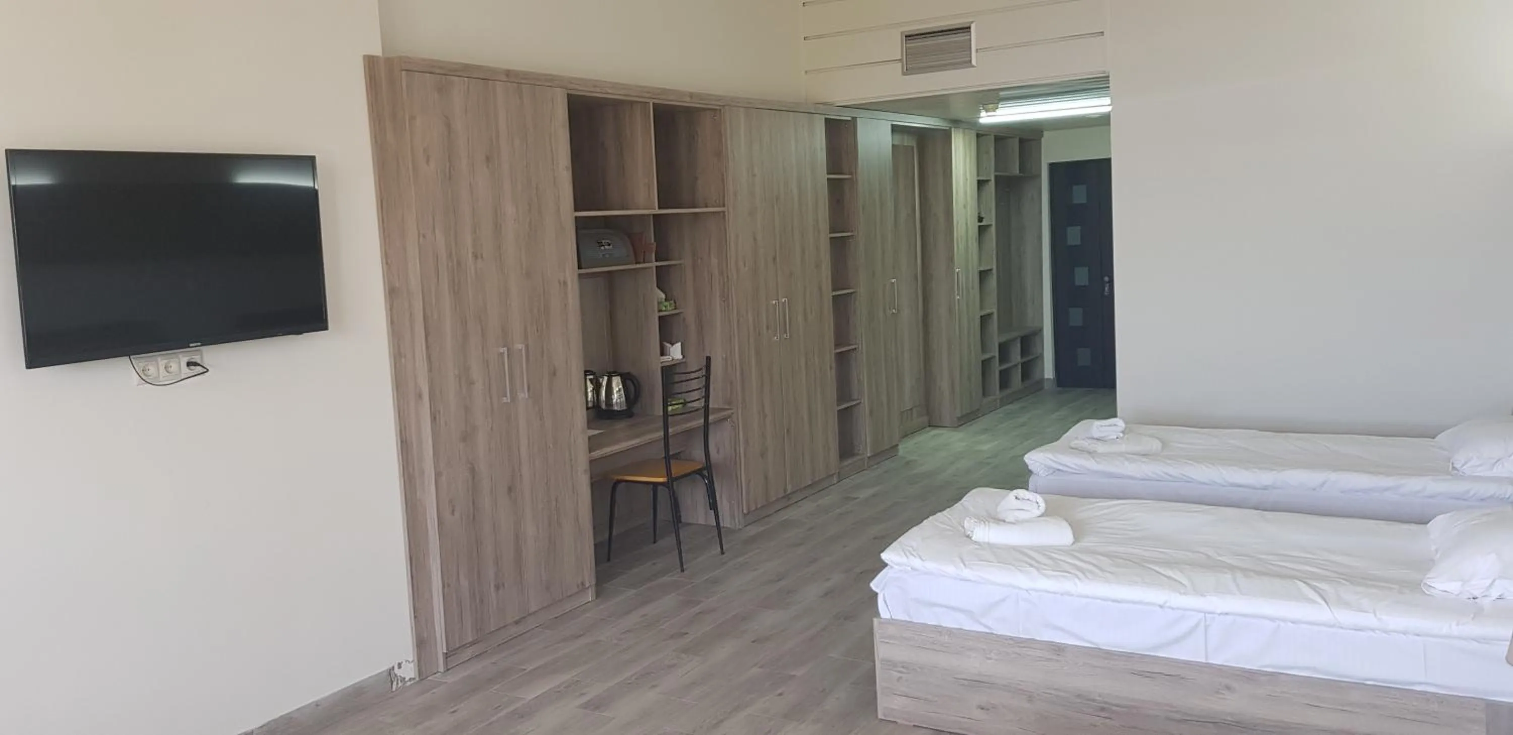 Photo of the whole room, Bed in Cross Health Spa Center