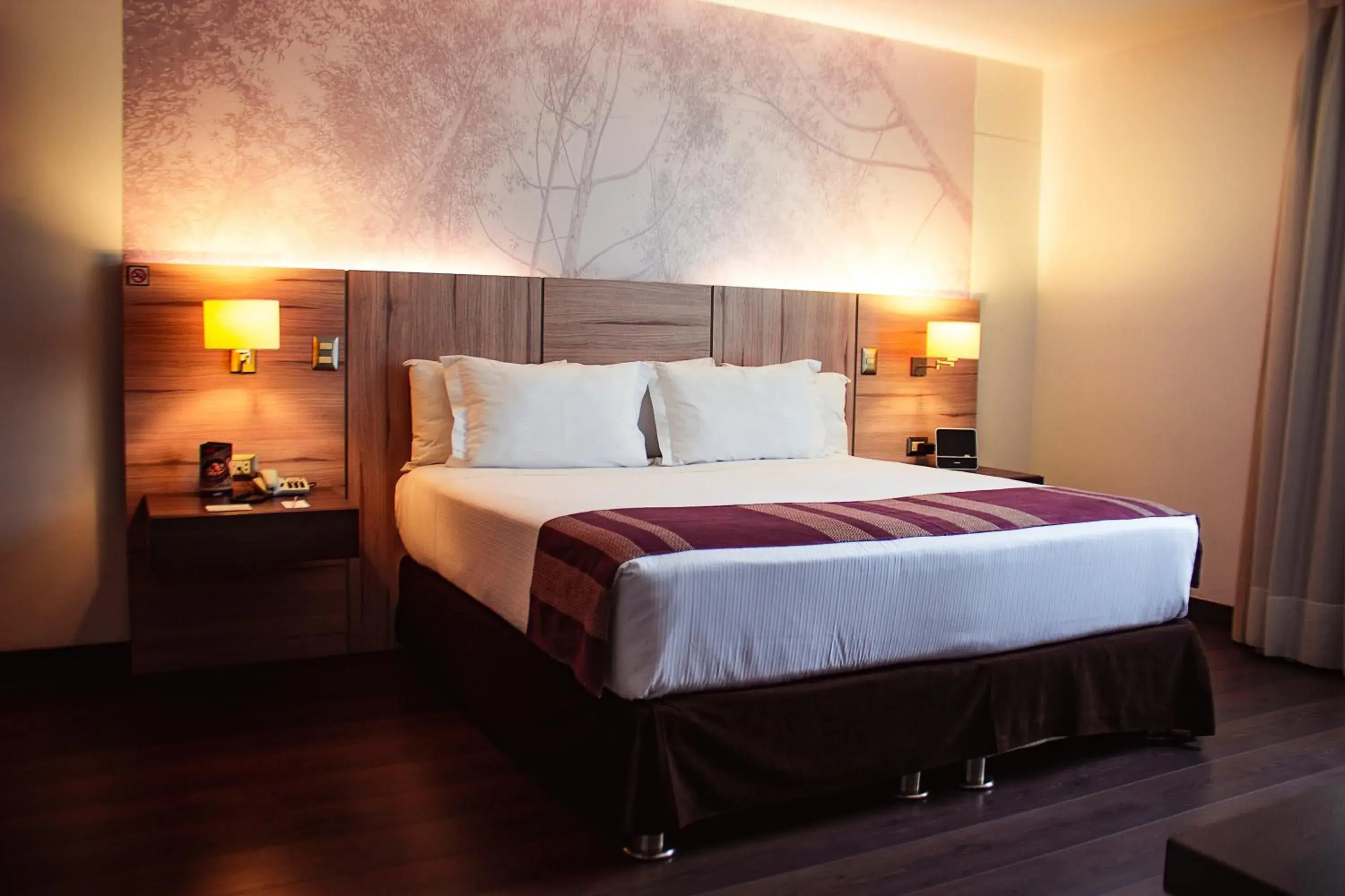 Bed in Aku Hotels Bed in Aku Hotels