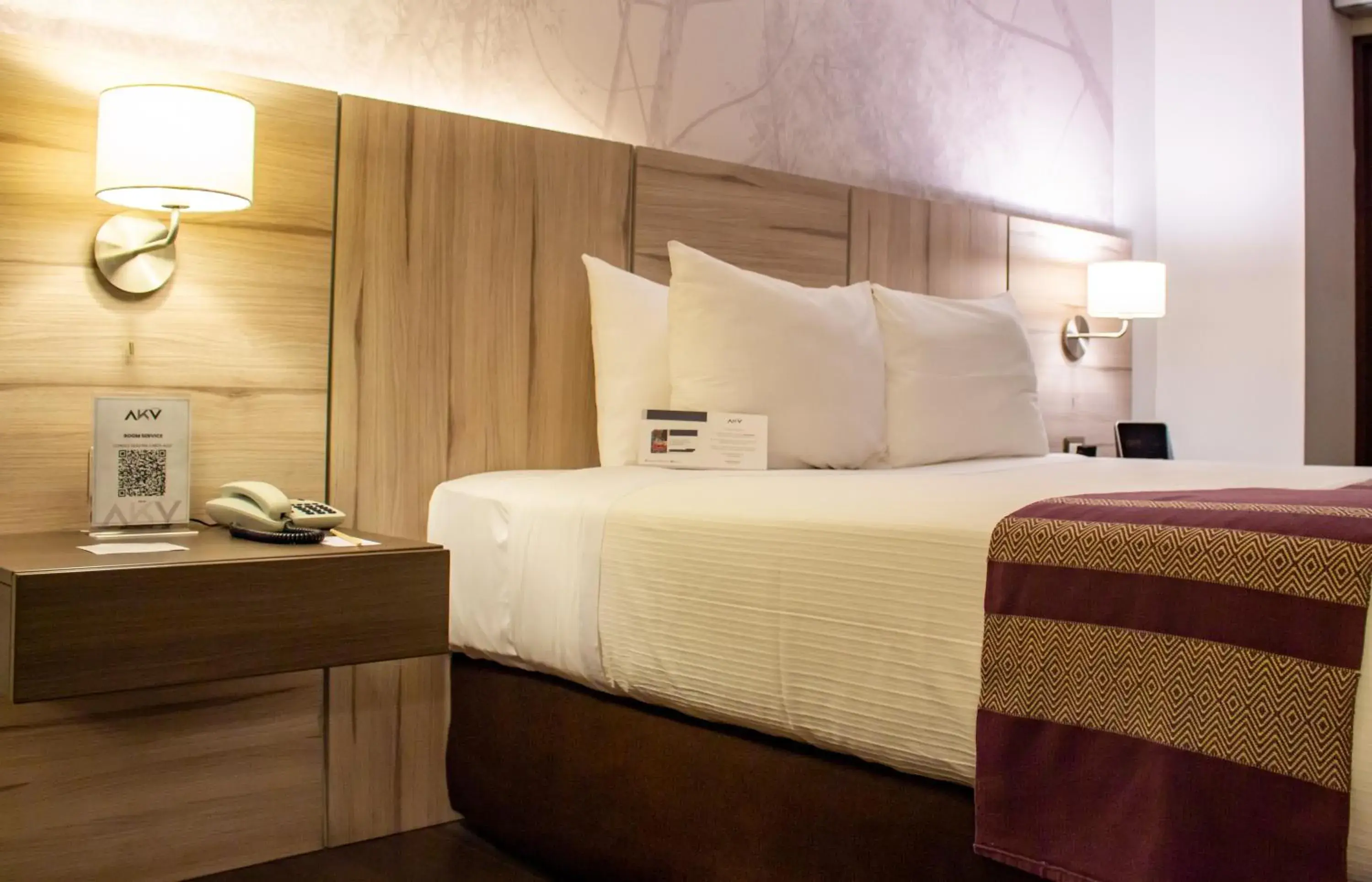 Bed in Aku Hotels Bed in Aku Hotels