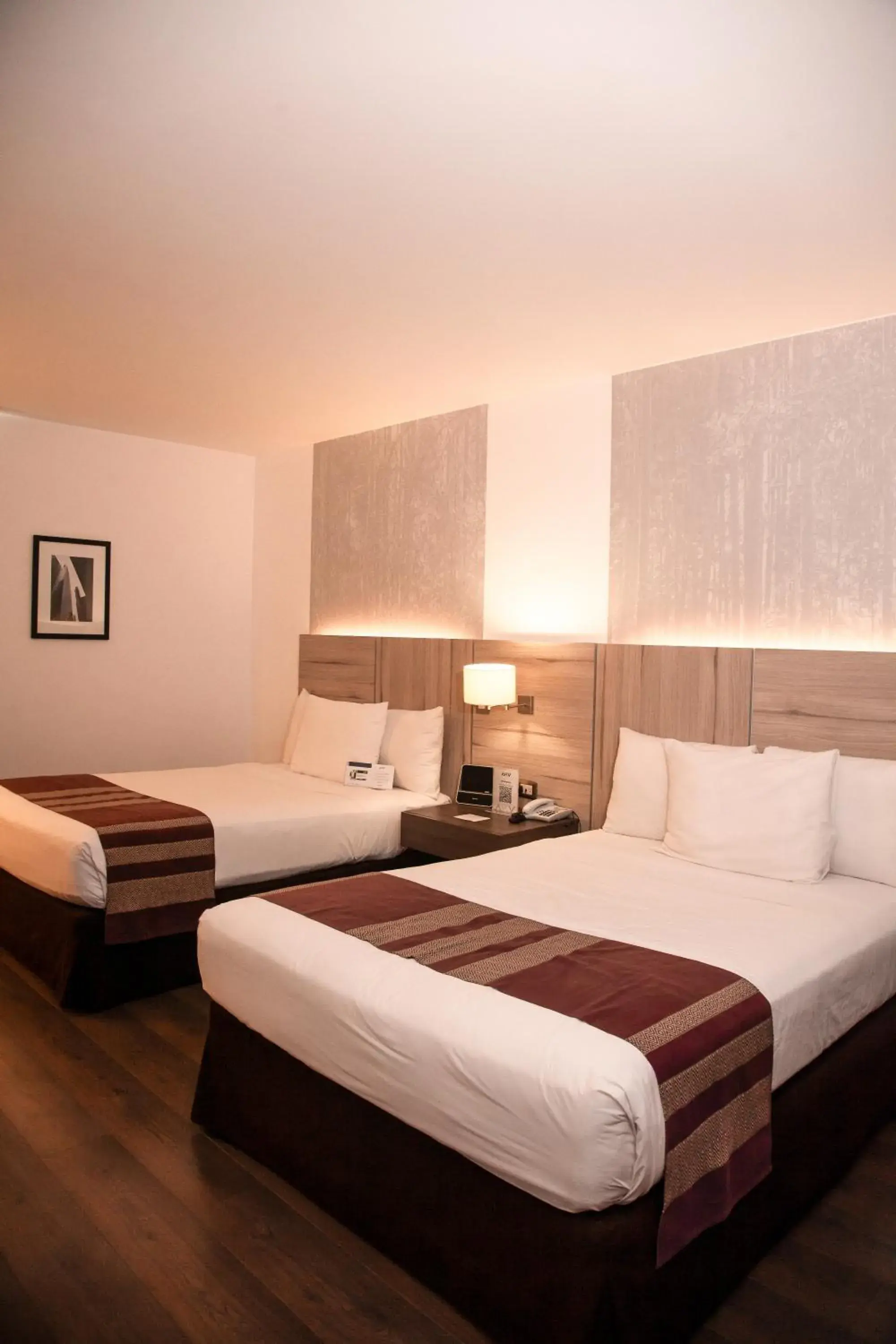 Bed in Aku Hotels Bed in Aku Hotels