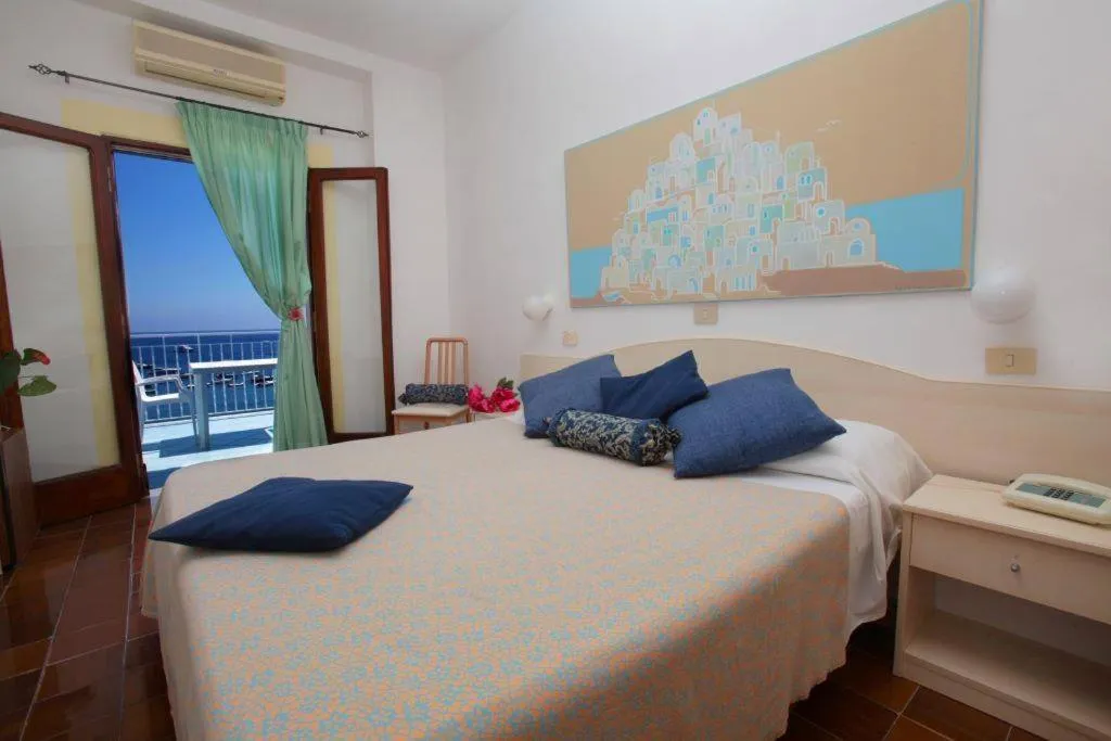 Bed in Hotel Casa Rosa Sea & Spa