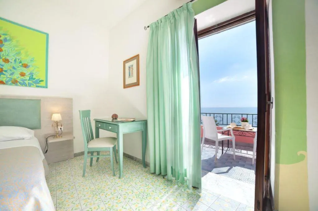 Bed in Hotel Casa Rosa Sea & Spa