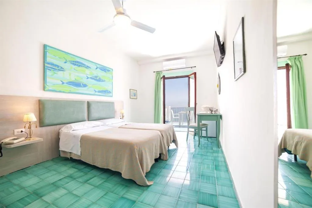 Bed in Hotel Casa Rosa Sea & Spa