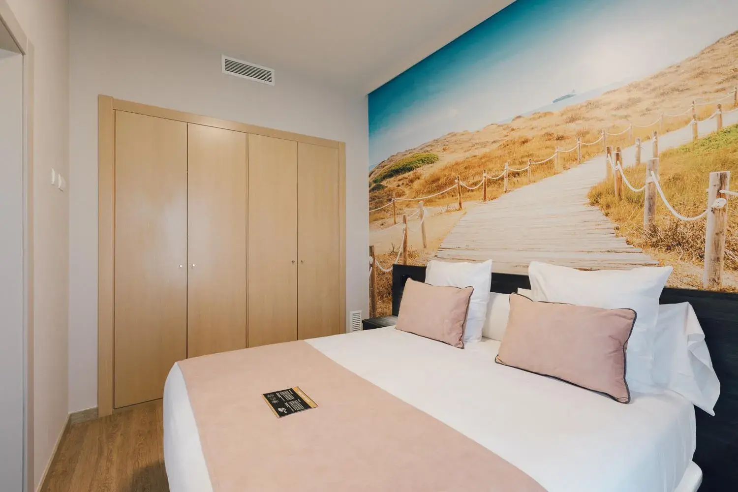 Bed in Palau Suites & Apartments Bed in Palau Suites & Apartments