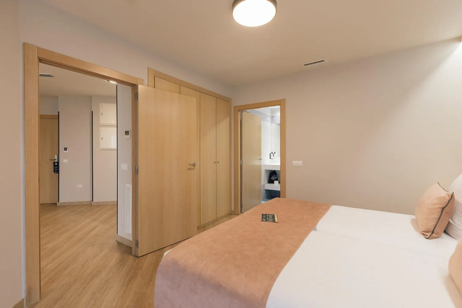 Bed in Palau Suites & Apartments