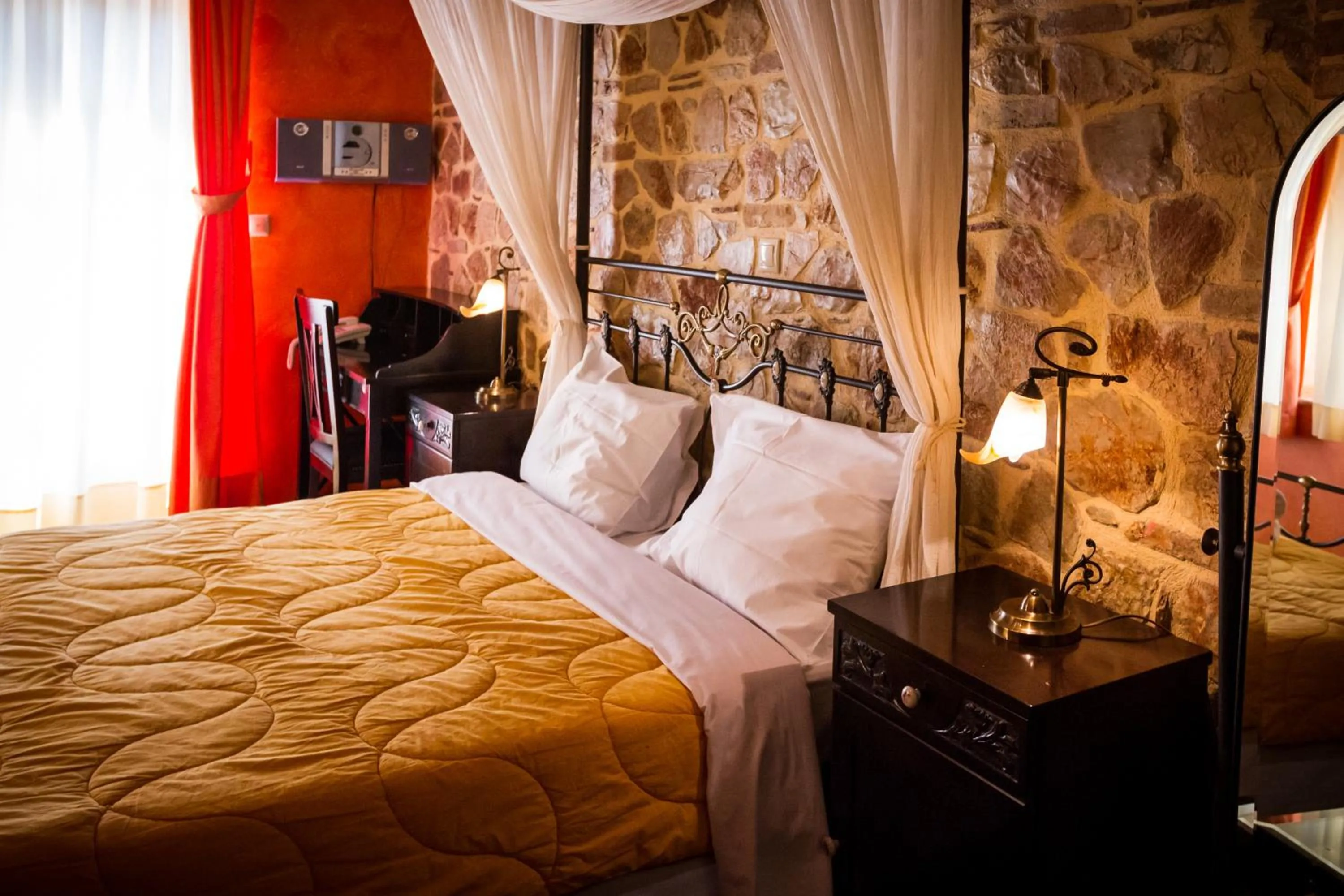 Seating area, Bed in Acronafplia Pension A